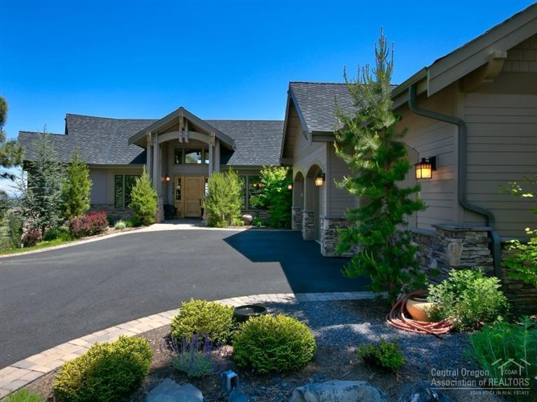 One of a kind river, Cascade Mtn, & city views from this stunning NW style home. Great room plan w/marble floor entry, stacked stone FP, hickory hardwood floor, & beautiful wood beams. Kitchen features solid slab granite counters, knotty alder cabinetry, walk-in pantry, SS appliances & breakfast nook. Spacious master boast a gas FP hearth, blt-ins, his & her closets, tiled shower, dual vanities w/marble counter tops & radiant floor heating. FR, media room & game room. Gorgeous landscaping w/water feature!