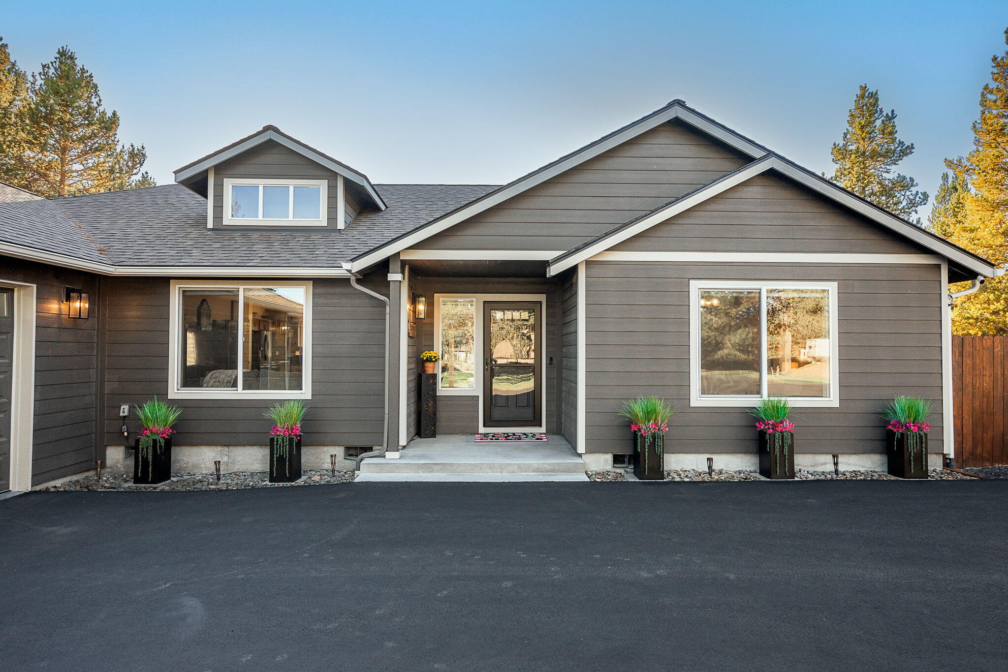 2.25% Assumable VA Loan — Home on the range...the driving range! This gorgeous 4bed / 2.5 bath, 2232 SF home sits on 1.19 manicured acres in La Pine's most sought-after neighborhood, backing directly to the 18-hole Quail Run Golf Course w/ its own ''Woodchip Lane'' for easy golf course access from the backyard. An open-concept layout, vaulted ceilings + 12' slider fill the home with light. The thoughtfully designed interior places the spacious primary suite on one side of the home + 3 guest beds on the other for comfort + separation. The kitchen + great room flow perfectly for entertaining; the dedicated dining area offers a spacious central gathering space. Step outside to a large covered patio overlooking a fully irrigated, manicured yard with gazebo—perfect for year-round outdoor living. The oversized 3-car garage features 8' doors + RV pad + full hookups. 6,300 SF of blacktop w/ circular driveway doubles as a pickleball court. Plus public access to the Little Deschutes River nearby!
