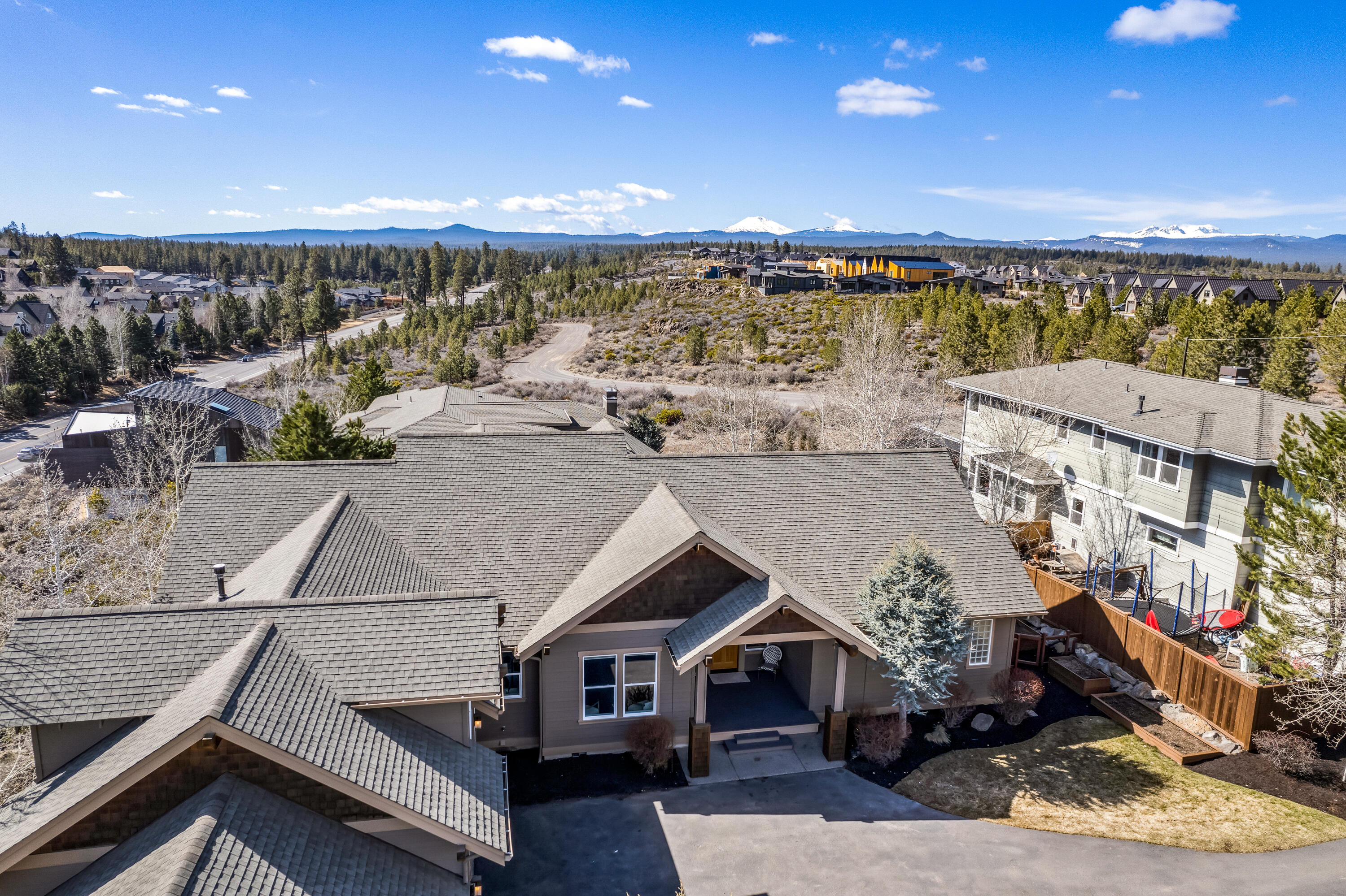 One of the best locations at 1st on the Hillsites. This handsome, NW style home was skillfully designed to take advantage of the Cascade Mountain views. The views are protected by adjacent Alpine Park. Gather friends and family in the newly renovated kitchen with a backdrop of Mt. Bachelor perfectly framed from the dining nook. The Cascade views continue into the fully appointed main level master suite. Guest bedrooms on the opposite wing from master afford just the right amount of privacy. The layout even accommodates separate work from home spaces with a roomy main level den in addition to a bonus room over the garage. Tired of cooking? The Row and Soloman's are just a ½ mile stroll away. Ride out your backdoor to Phil's Trail, Alpine Trail, The River Trail, and more! Nature's bounty is easy to grow in the sun-drenched backyard with all-organic raised beds. Located in a relaxed, established neighborhood with no HOA's and minimal covenants.