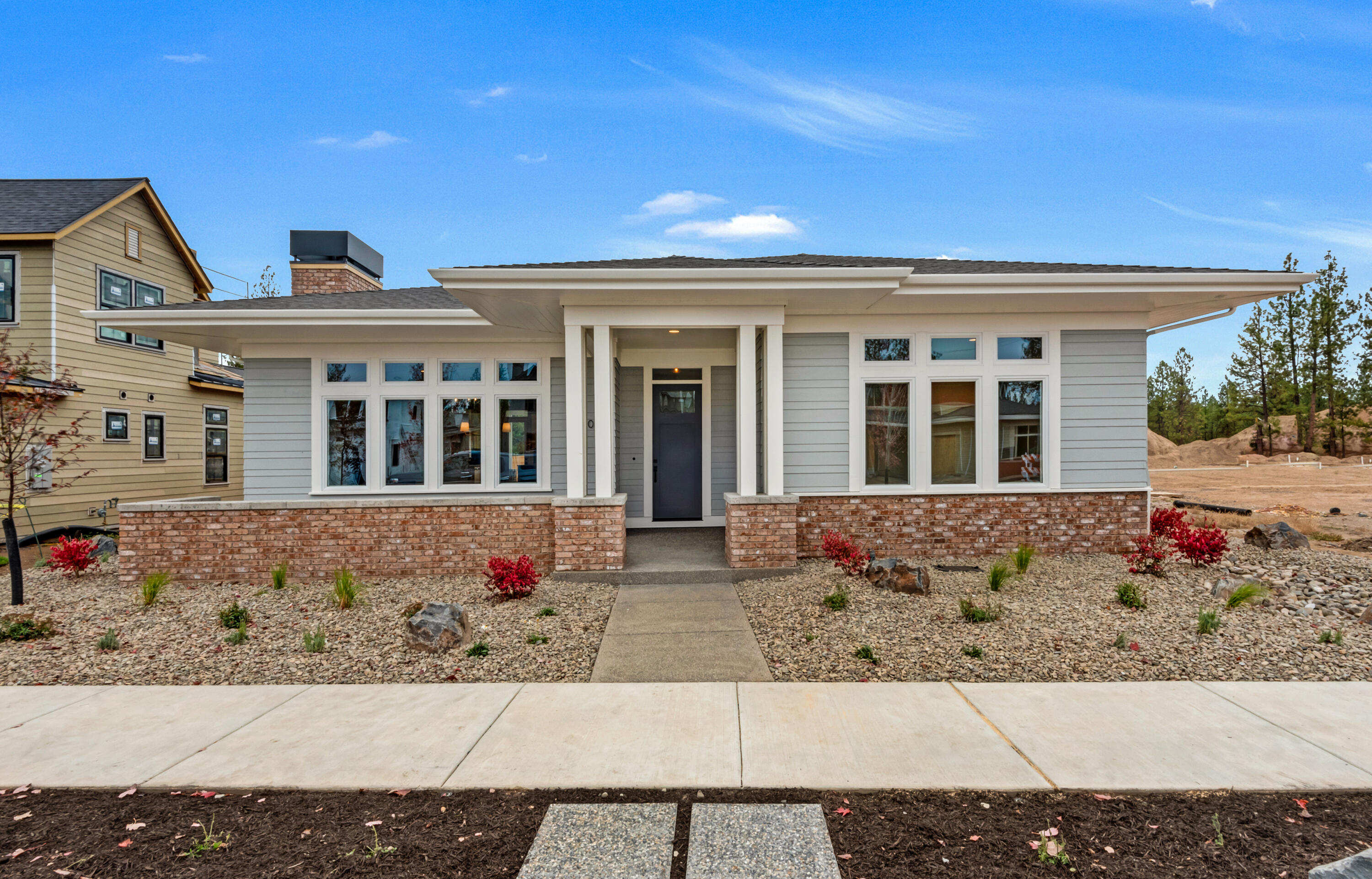Stunning Discovery West, Frank Lloyd Wright inspired home built by award-winning Greg Welch Construction. Covered front porch leads to entry/great room engulfed in natural light. Kitchen features exquisite appliance package, slab quartz counters and custom built-in cabinetry with soft-close doors and drawers. Resident suite with tiled walk-in shower, radiant heated bathroom floors and expansive walk-in closet. Adjacent to the resident suite is a private office/study with a view of the rear patio & yard. Additional two guest bedrooms, full bathroom with good separation from the resident suite. Discovery West, situated on 245 acres on Bend's westside, is the newest community by the developers behind the award-winning NorthWest Crossing neighborhood. The neighborhood will offer a variety of home types and sizes, as well as a community plaza and 40 acres of parks, trails and open land.