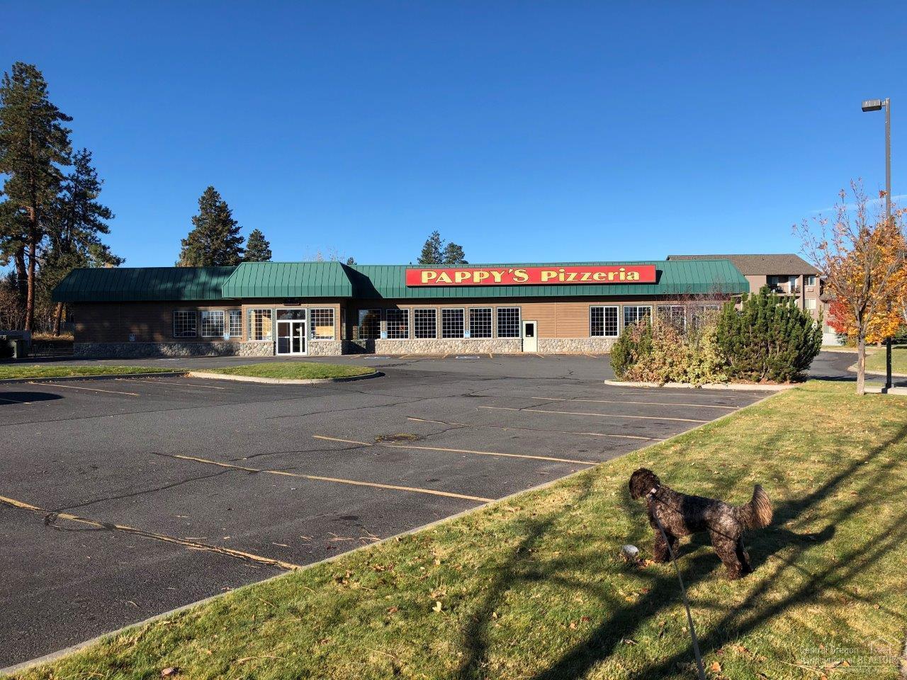 Ideal opportunity for an owner/user or investor to own a key property on 3rd Street/Hwy 97 directly across from Fred Meyer. Excellent location for a restaurant/retail operator, daycare or event center.<br><div>Single story building includes a large commercial pizza kitchen, indoor seating for +/-300 patrons, a large open area (currently, a playroom) with potential to create patio seating. Potential for additional development on land.</div><div><br></div>Property is currently occupied by Pappy's Pizzeria. Business sold separately or will be delivered vacant.