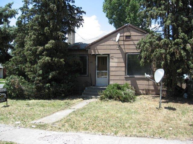 Solid home located on a nice corner lot. Good floor plan. With a new roof, some paint and carpet this home will be as good as new. Don't miss the 325 square foot finished storage room behind the carport. Great price for this home.