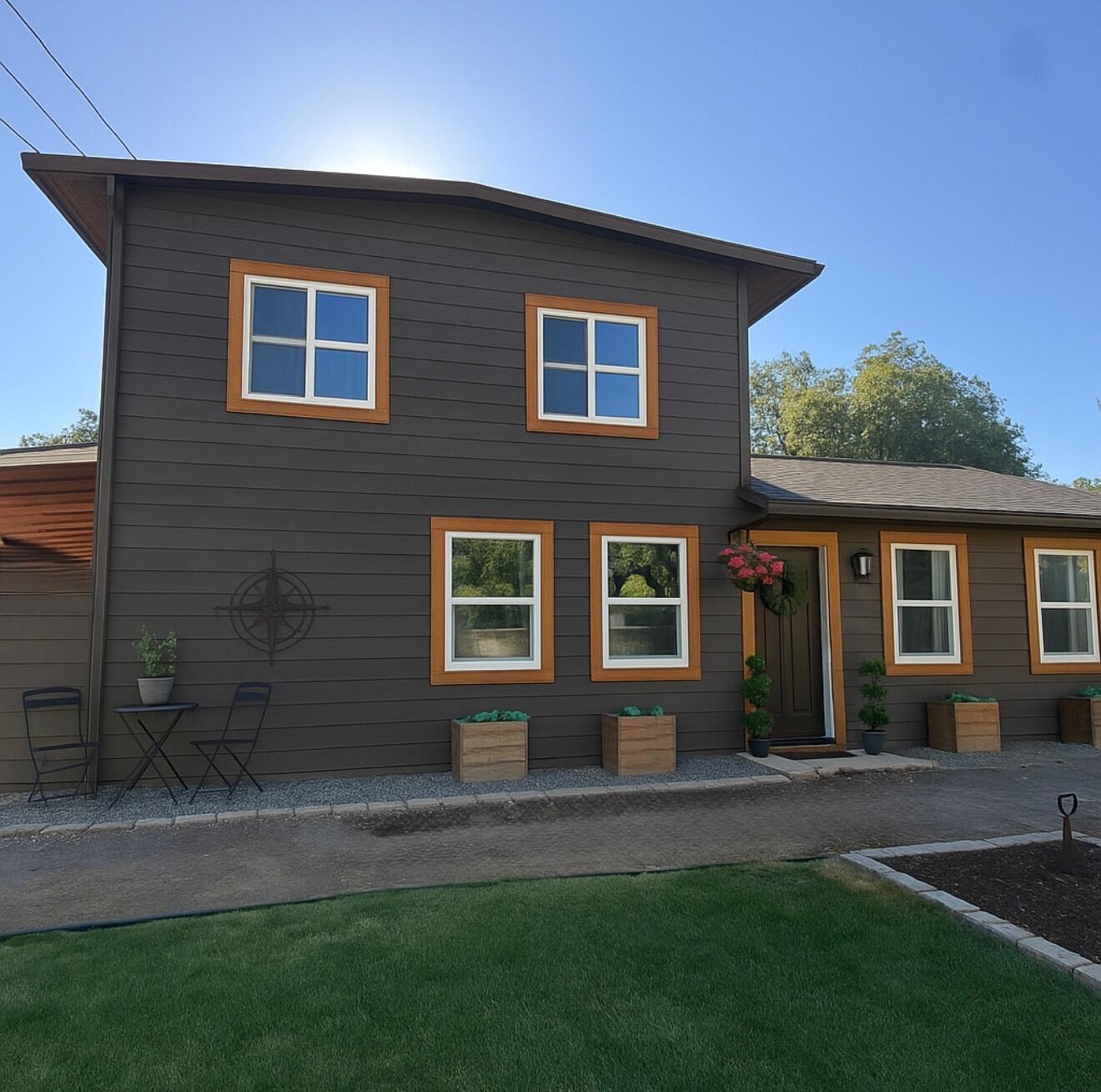 Looking for more space, in the country but close to town? Look no further! This large home had approx. 1,000 sq ft added onto it 21/22. It sits on a flat, well maintained 1.17 acres and features 2 shops/outbuildings, a gazebo, a fire pit area off the covered patio, newer fencing, mature trees and parking galore! Inside, you will find vaulted ceilings, wood beams, a 17' walk-in closet in the downstairs primary suite, a spa-like industrial primary bathroom with a free-standing tub, a huge pantry/laundry room combo, a 5 head ductless mini-split HVAC system, upgraded lighting fixtures and recessed lighting, architectural arches. This is a 4 bedroom home, however, seller has turned 2 of the bedrooms into a large 2nd primary suite upstairs, with walk-in closet and attached bath. All 3 bedrooms are connected to a bathroom. Seller can put the wall back up to make it a 4 bedroom home again, if buyer would like. 

Listing agent has vested interest in the property.
