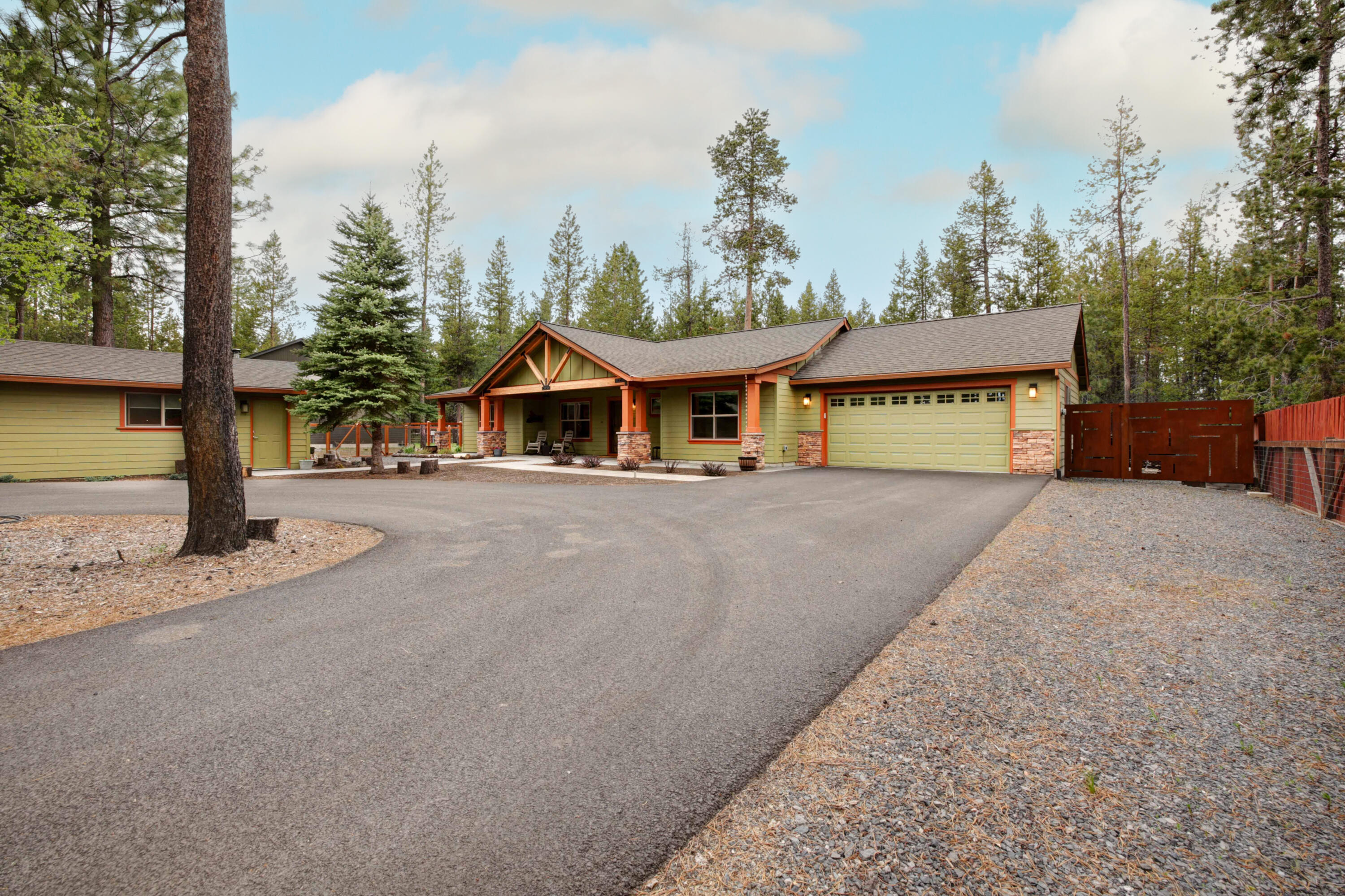 Perfect opportunity to own your own piece of paradise in the heart of Central Oregon's mecca of rivers, lakes, and thousands of acres of National Forest where you can ski in the morning and paddle board in the afternoon! Not a detail was missed with this like brand new upgraded home. Custom features of this home include hand troweled walls, solid wood doors & soft close cabinetry throughout, double sink vanities, large capacity water filter/softener, propane fireplace & firepit, garage storage system, Bocci Ball court w/ lighting, custom lighting throughout, drip system, oversize patios, 18 x 30 woodworking shop that could easily be converted to a game room or studio, instant hot water system, fenced yard, engineered hardwood & tile flooring, primary suite boasts walk in shower w/ access to hot tub w/ custom privacy fencing, triple pane windows with custom shades, coffee and wine bar, and much more. A must see property to appreciate the level of workmanship and attention to detail!