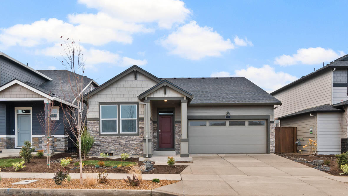 RED TAG SALES EVENT!  Special rate and closing cost incentive with use of builder's preferred lender!!  Call for details!!  Move in ready! Visit Stevens Ranch in Bend, located near Reed Market Rd in a serene residential area with access to outdoor living and adventure, the city, and historic downtown Bend. Move in ready with blinds and A/C!! Home sides to community park! The Spruce is a functional 1,435 sq. ft., one-level 3 bed 2 bath floor plan with Smart Home Technology included! The two front bedrooms are centrally located between a full bathroom. The stylish kitchen has stainless-steel appliances, quartz countertops, full height backsplash, pantry, central island, and a gas range/oven. The dining area flows into a light and bright great room with a cozy fireplace, ideal for entertaining. Primary bedroom includes a walk-in closet, en suite with double vanity, and extra storage. Sales office hours are 10am - 5:30pm daily. Photos are representative of plan, features/specs may vary!