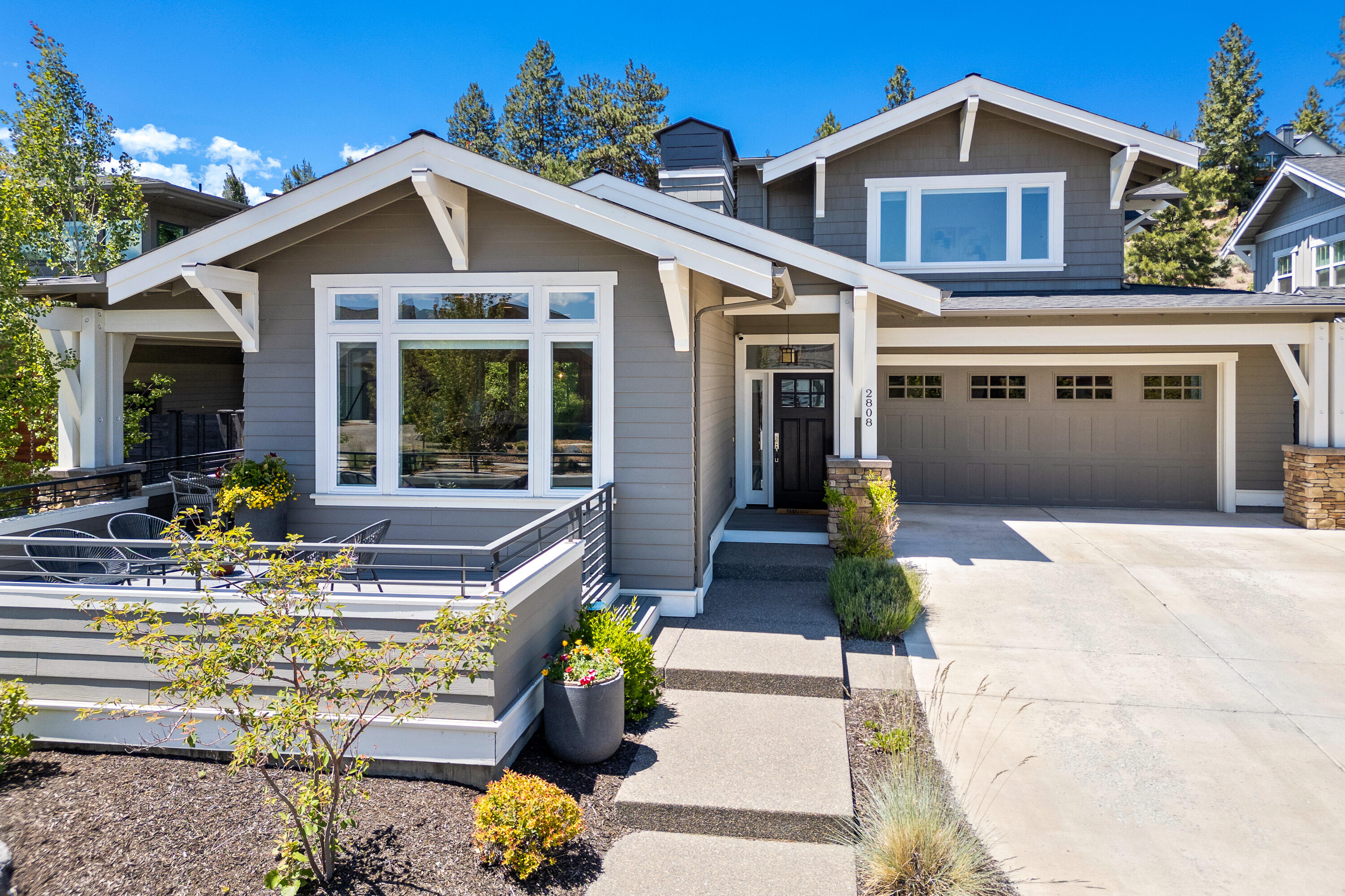 Discover your sanctuary in Northwest Crossing with this exquisite Greg Welch-built home on the coveted Shields cul-de-sac. Step inside to find gorgeous hardwood floors and soaring ceilings in the open-concept living space flooded with natural light. The main floor features a window filled office and a luxurious primary suite with a soaking tub and walk-in closet. Upstairs, a versatile bonus room awaits alongside two bedrooms and a full bath, complemented by a built-in desk for added functionality. Outside, the large front deck and thoughtfully designed backyard offer low-maintenance outdoor living with private mature landscaping that backs up to Bend Parks and Rec land. For the avid outdoors enthusiast, the oversized 2-car garage includes a bonus area for all you gear, while a 6KW solar power system and Earth Advantage Gold Certification ensures incredibly low energy costs. A short distance from Discovery Park, shopping, and dining, this home epitomizes Bend living at its finest.