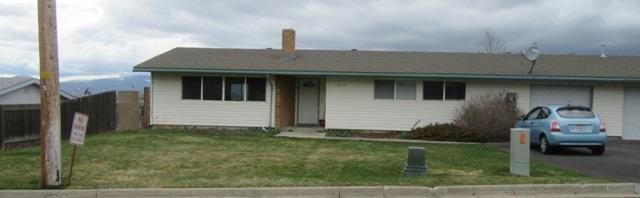Nice 3 bedroom 1 1/2 bath. gas Fireplace and formal dining room and snack bar counter. Newer appliances that stay with home, in house Laundry, 1 car garage, Patio, & good size level backyard. No Neighbor directly behind home. Alley access from back possible. View of Mountains and valley. Needs new flooring and rear fence repair. Seller will give $3,000 credit towards new flooring.