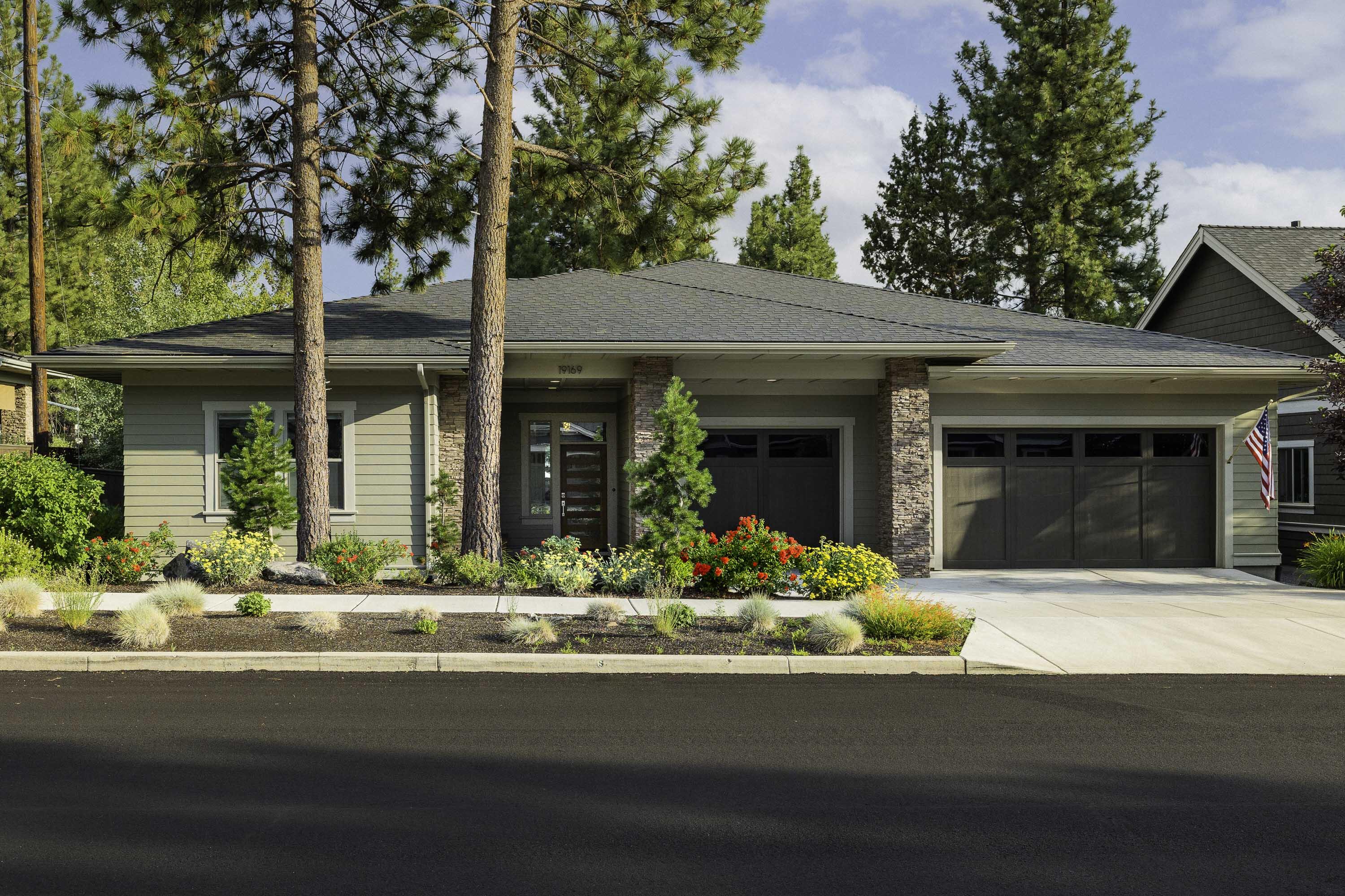 This stunning, single level home with an oversized 3 car garage in NW Bend was built to earth advantage standards and has been meticulously maintained. The kitchen is gorgeous with an oversized quartz island, full back splash, Jenn-Air appliances, extensive cabinetry, and large walk-in pantry. The master suite has nice separation from the other bedrooms and is generous in size with radiant floor heat, soaking tub, full tile shower, and spacious closet with built ins. The 10' ceilings throughout create an open and airy feeling with upgraded lighting, built in speakers, and dual zones for heating and cooling. Outside you will find a fully fenced backyard with a large aggregate patio, mature landscaping, and a clear view of Mt. Bachelor between the trees. This awesome location is less than 1 mile to the serenity of 981 Acres known as Shevlin Park with abundant mountain biking and hiking trails.