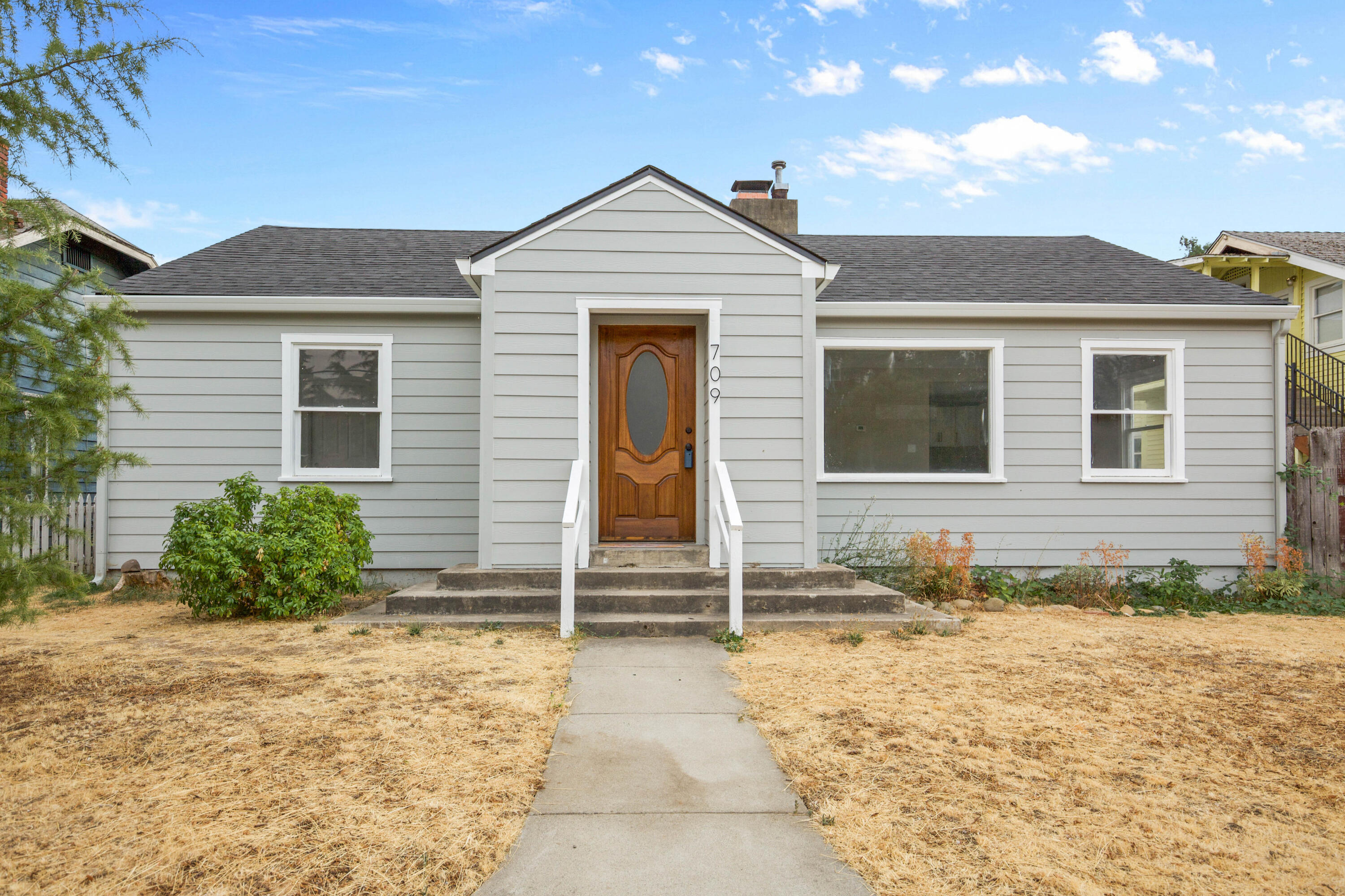 Beautifully remodeled Medford opportunity offering versatility and investment potential! The main home features 2 bedrooms, 1 bath, and 999 sqft of stylish living space with modern finishes throughout. Updates include new flooring, fresh paint, upgraded kitchen and bath, and thoughtful touches that make it move-in ready. Tucked behind is a 440 sqft 1 bed/1 bath ADU, also fully renovated, perfect for extended family, guests, or rental income. Conveniently located near downtown Medford, shopping, and schools, this property offers both comfort and opportunity. Whether you're looking for a primary residence with supplemental income or a smart addition to your portfolio, this is a must-see. Prior to the remodel, main home was renting for $1,500 and the ADU was renting for $850