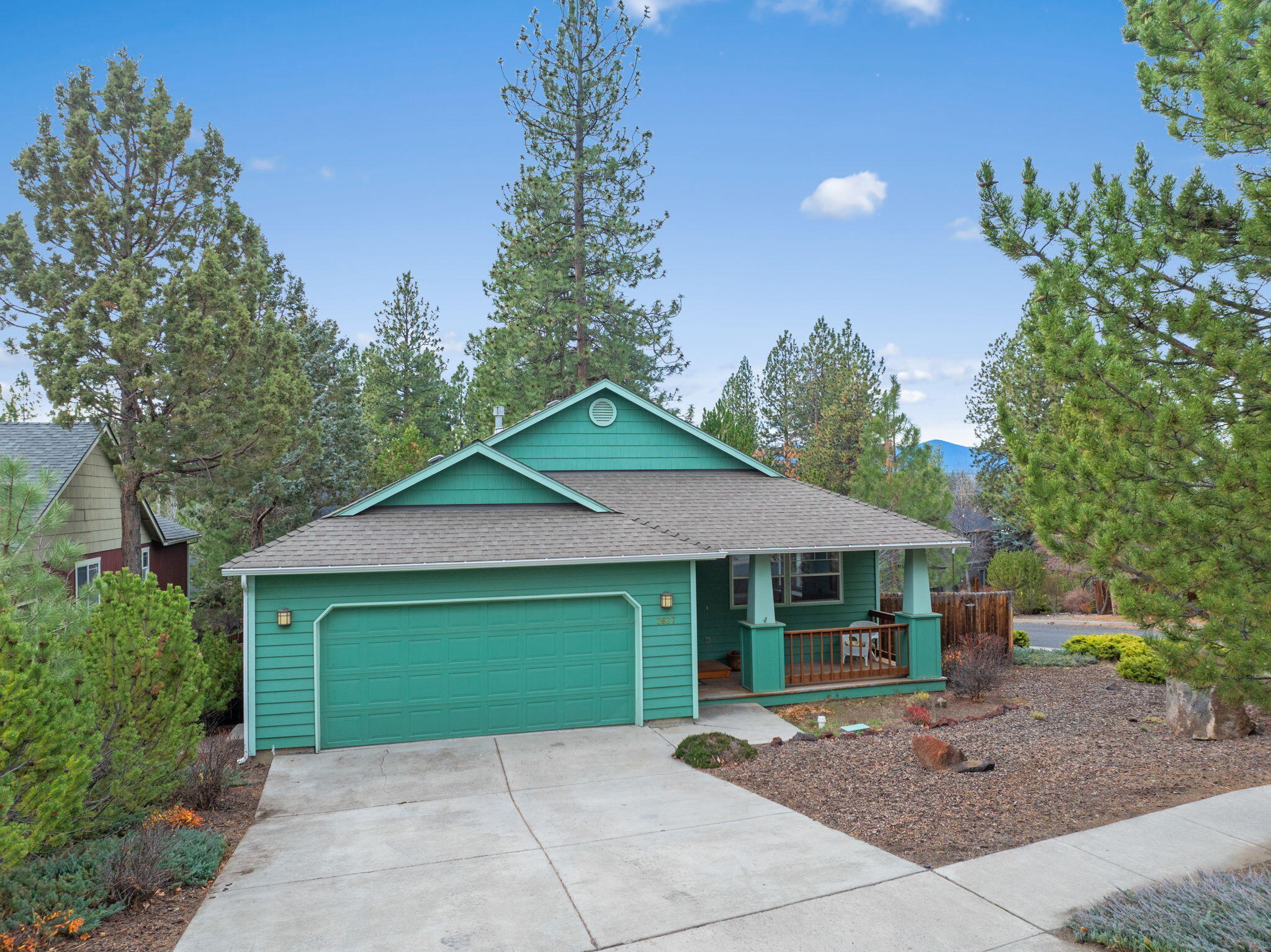 Bring your vision to life in one of Bend's most beloved neighborhoods! Awbrey Ridge is the kind of neighborhood where kids still play in the street, block parties happen, and trick-or-treating is next-level. The 3 bedroom, 2 bath single-level home sits on a low-maintenance corner lot with back deck, fenced backyard, and new roof! The interior is light and bright with vaulted ceilings and will shine with some minor cosmetic updates. In addition to the 2-car garage, there's a large dry storage area under the house. At the end of the quiet cul-de-sac, Quail Park invites morning walks, playtime and games of pickle ball and basketball, and Shevlin Park is minutes down the road for long hikes and fishing in Shevlin Pond. Conveniently located close to schools (1.5 miles to High Lakes Elementary and Summit High School, and 2 miles to Pacific Crest Middle School) and just over a mile from The Grove for coffee, dining, and community vibes. A great opportunity to create your dream home!