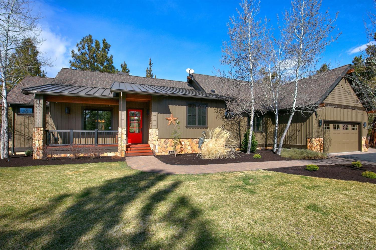 This impressive property on 2.17 acres includes a gorgeous custom lodge-style home & a car enthusiast's dream shop, accessed by a paved road & driveway. The 4,630-square-foot insulated, heated shop has epoxy flooring, RV rollup doors, multiple workbenches, an enclosed office & additional storage shed. The 3,044-square-foot home boasts full custom construction, with wood trim windows, slate & hickory floors, great room with fireplace, & gourmet kitchen with center island & granite countertops. The main-floor master bedroom has a large walk-in closet & ensuite bathroom with dual vanities, built-in cabinetry & oversize walk-in shower. Each of the two downstairs bedrooms has a private bath; upstairs includes a large bonus room & fourth bedroom. Also: mudroom with custom sink adjacent to the 1,444-square-foot 4-car extended garage. 50-year CertainTeed Roof on the home & 40-year roof on the shop. Newly landscaped; new high-efficiency heat pump & exterior paint in 2019.