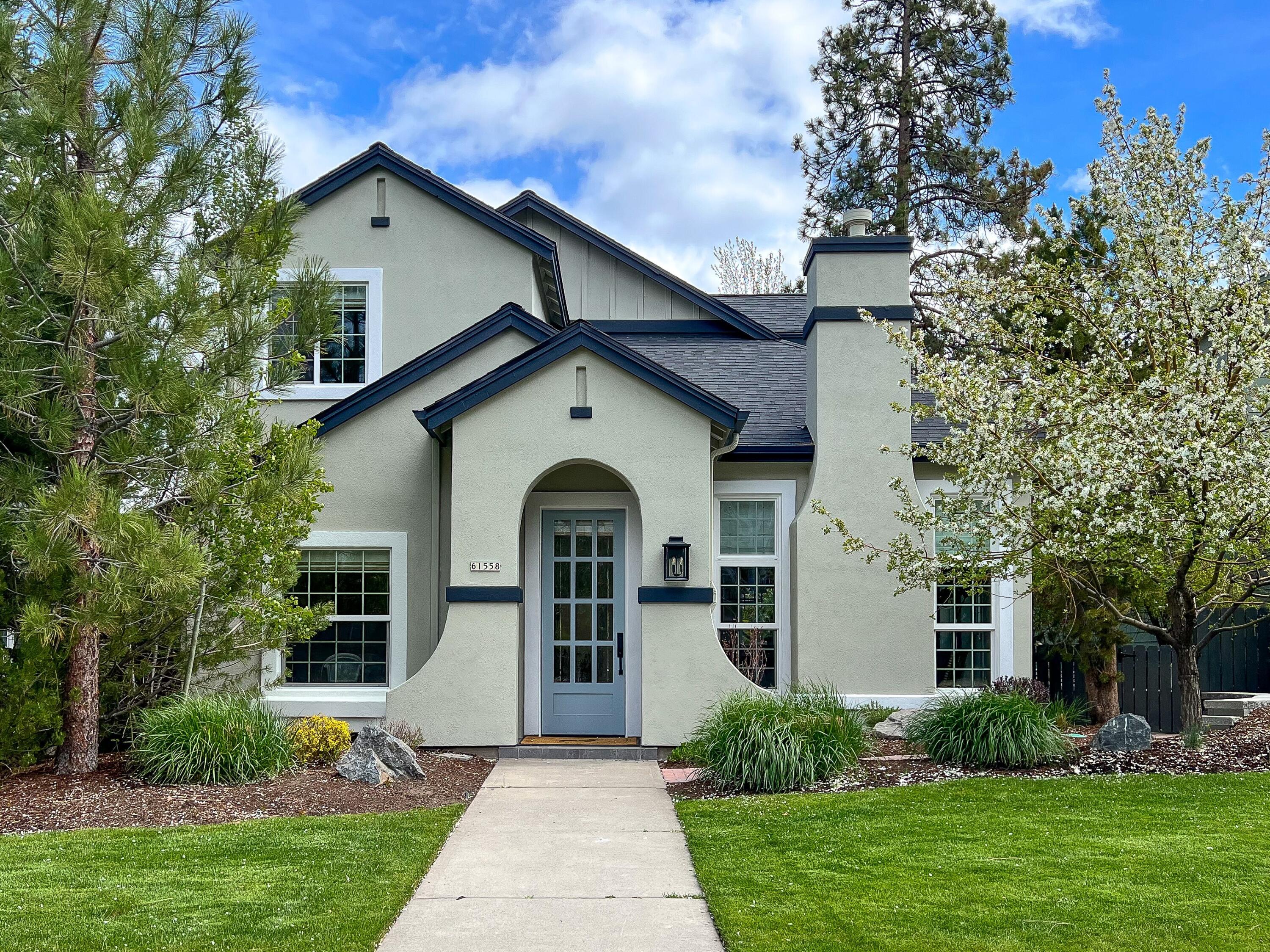 Beautiful contemporary remodeled 3 bedroom home located in the highly desired Parks at Broken Top on Bend's Westside. Nestled across the street from one of three expansive green parks within the neighborhood, this completely remodeled home feels like something out of a Nancy Meyer's movie. Designer kitchen features exquisite lighting fixtures, quartz marble counters, new cabinets and top of the line stainless appliances. Open great room and adjacent gathering areas are bright and inviting. All new light wood flooring throughout the entire home with remodeled bathrooms with stunning design details. Gas fireplace in the great room and upstairs master suite create the perfect cozy setting for cool evenings. Floor heat in bath. Private gated backyard with large seating area. New roof, new A/C and heating system.