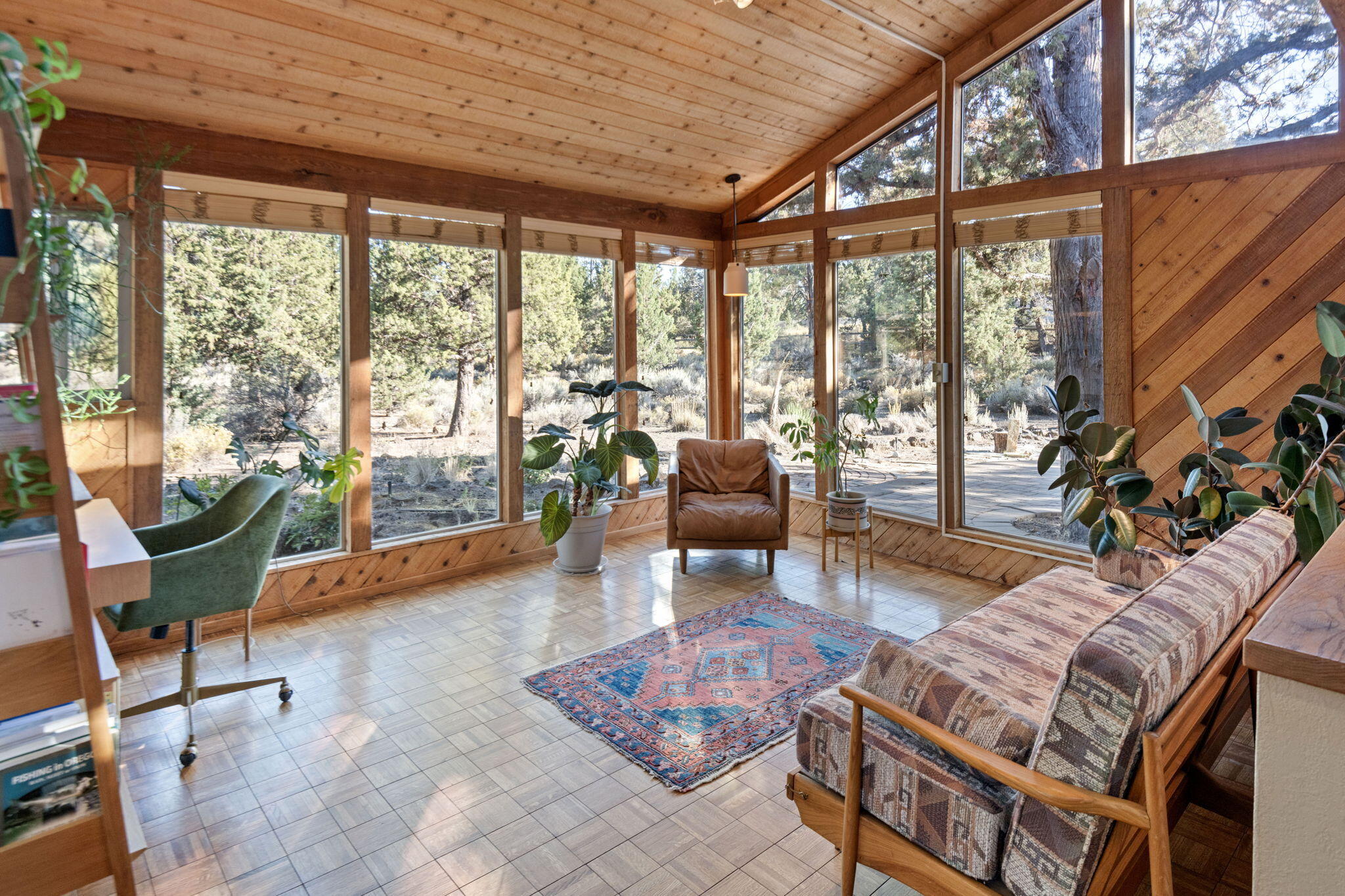 Don't miss this rare opportunity to own a 1.12-acre lot in the highly desirable JD Ranch Estates. Located on a quiet cul-de-sac just minutes from town, this Mid-Century style home offers privacy, space, and convenience.

The main-level primary suite, spacious remodeled kitchen with all new appliances, and light filled sun-room provide a comfortable and functional layout. Both bathrooms have also been beautifully remodeled for a fresh, modern feel. Additional highlights include a private outdoor sauna, cozy wood stove, and many upgrades such as a Payne heat pump, energy-efficient vinyl windows, and a heat pump water heater.

Enjoy beautiful trails right out the back door to public lands and a newly fenced area of approximately 1/4 acre, perfect for pets. Also be sure to check out the rock climbing wall in the garage!

JD Ranch Estates features over 4 acres of common space with tennis and pickleball courts. Just minutes to Pine Nursery Park, east side dining, shopping, and schools