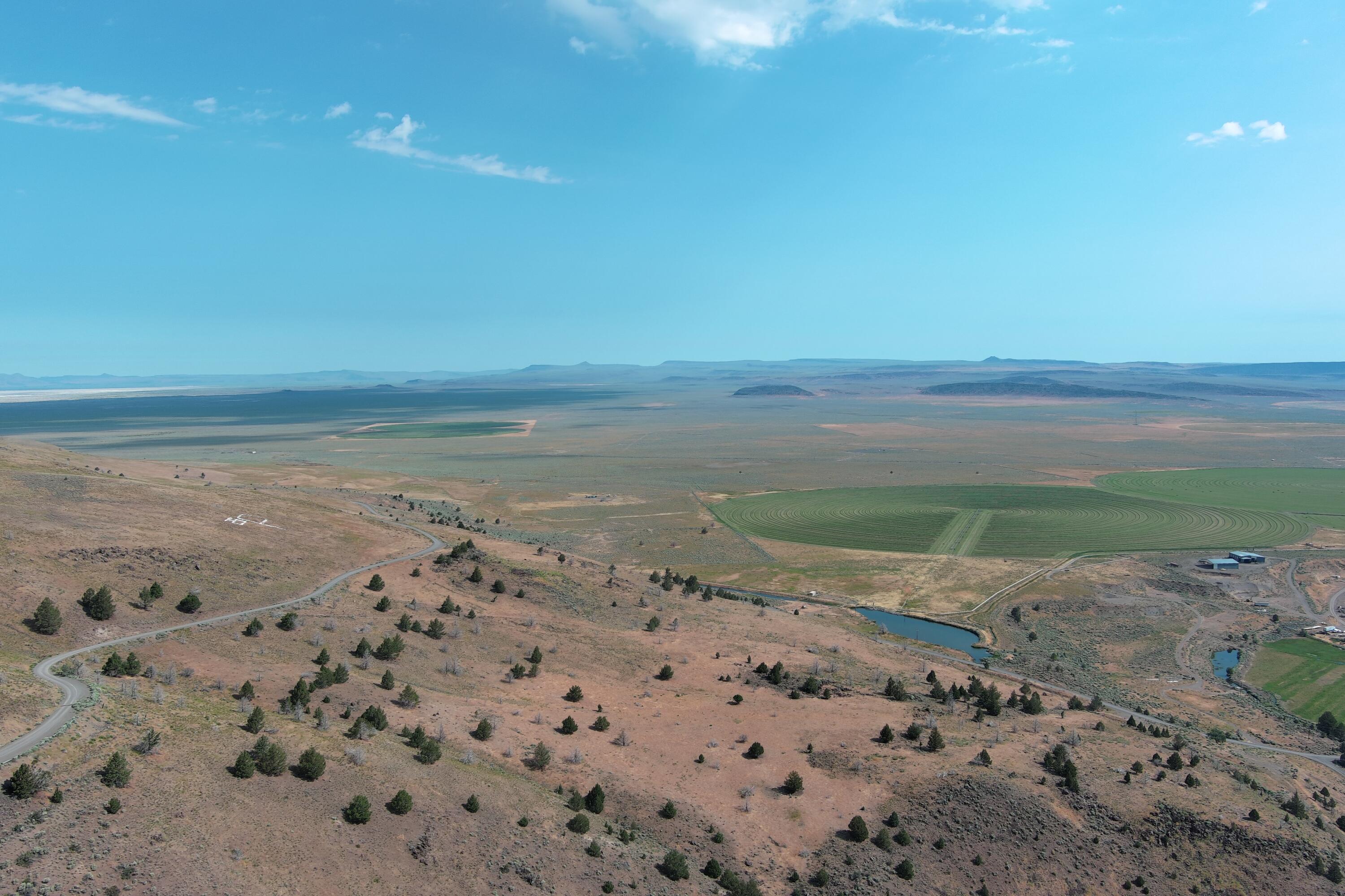Are you ready to sow the seeds of success and embark on a journey that could redefine your future in agriculture? Picture this: a sprawling, prime agricultural gem spanning an impressive 778.72 acres of 
fertile farmland, just waiting for your innovative vision to take root and flourish. This isn't just any piece of land—it's a versatile powerhouse designed for modern farming, sustainability, and even recreational bliss, all nestled conveniently near the charming town of Paisley, Oregon. Let's start with the heart of this operation: 340 acres dedicated to premium alfalfa, thriving under state-of-

the-art pivot irrigation systems that ensure reliable, high-quality yields year after year. On average, you're  looking at a robust 5-6 tons per acre, but with dedicated care—optimal watering, timely harvesting, andnutrient management—you can push that to 7 tons or more per acre. Imagine the possibilities: bountiful harvests that