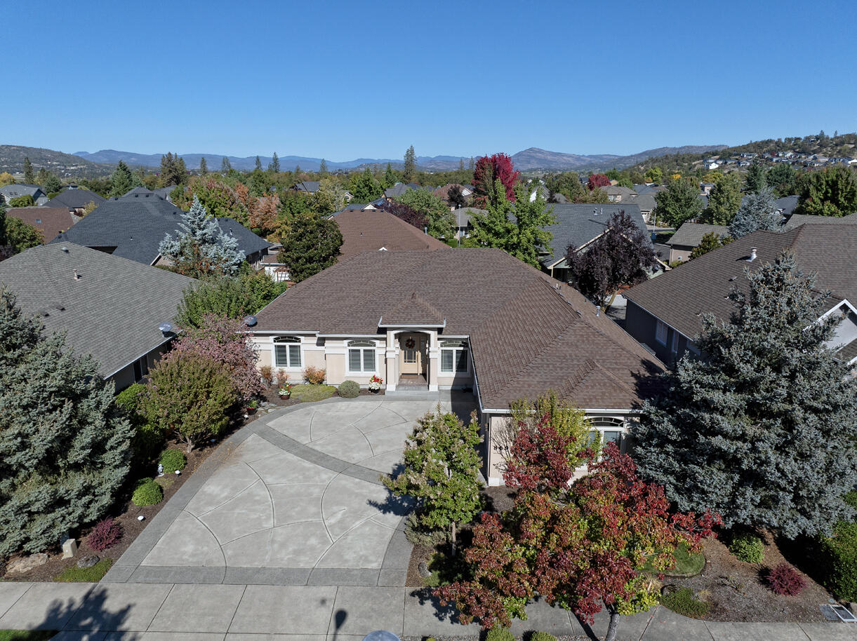 869 St. Andrews Way is a meticulously maintained 4-bd, 2-bath home in the prestigious Eagle Point Golf Course Community. This 2,236 sq ft single-level residence showcases pride of ownership at every turn. Located on a quiet, tucked-away street just across from the golf course, this home offers serene living. Step inside to discover vaulted ceilings with elegant architectural details & a wonderful layout filled with natural light. The inviting living room features a striking gas fireplace flanked by windows, a perfect focal point. The bright, white kitchen features granite countertops, quality appliances, hardwood flooring, & abundant cabinetry. The spacious primary suite is complete with walk in closet & ensuite bathroom with soaking tub & tile shower. Three additional guest bedrooms & a guest bath complete the split floor plan. The oversized 3-car garage provides ample storage, A large covered patio is the star of your fenced, landscaped backyard. Schedule your private showing today!