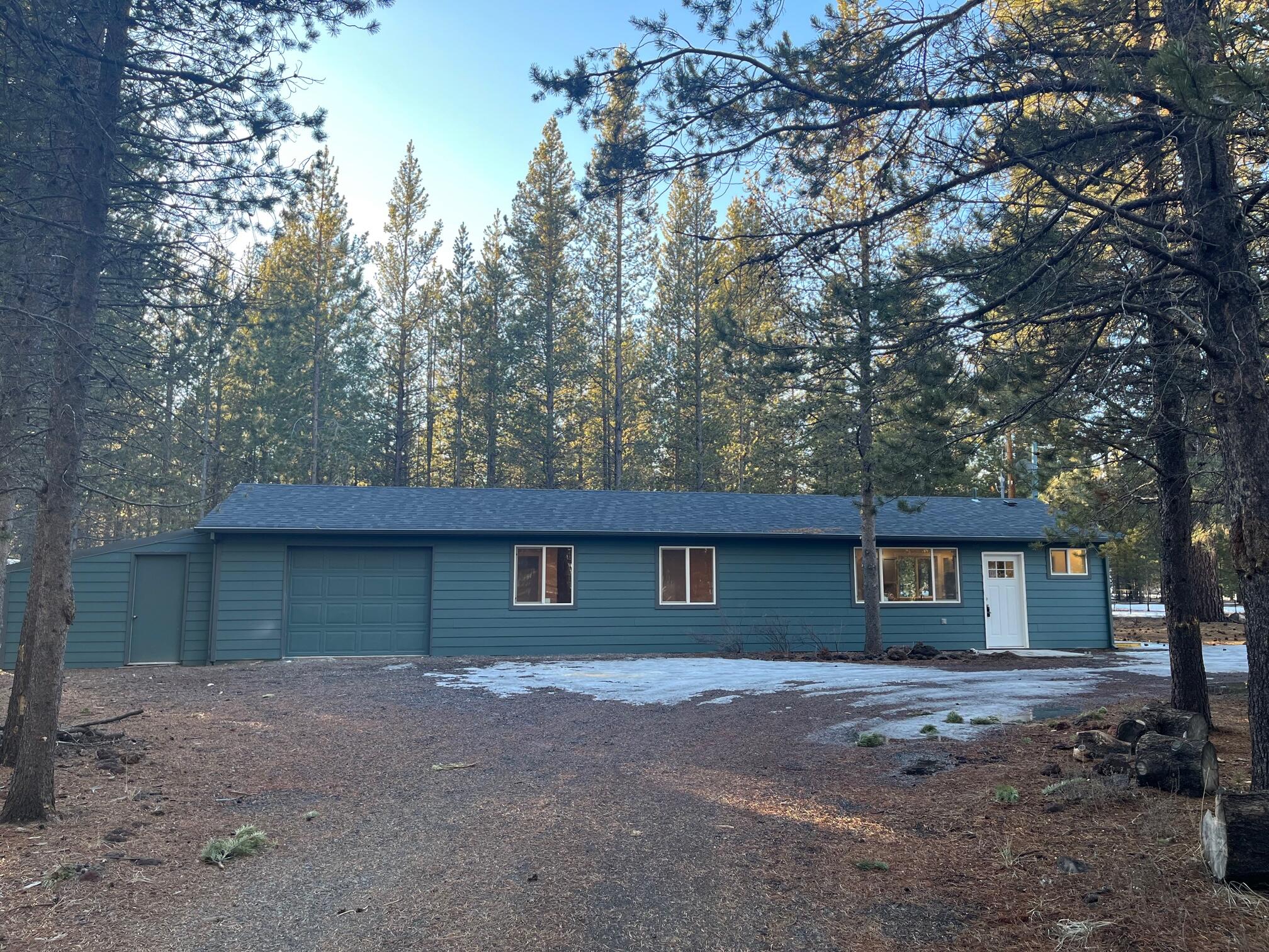 Amazing, remodeled home from top to bottom!!! MOVE IN READY! Almost an acre-fencing on 3 sides-U-driveway-many options for the fire pit-2 FULL RV HOOKUPS in front of home-attached one car garage with an attached workshop-New heat pump with A/C-beautiful trees on property giving a woodsy feel-Did you see the KITCHEN!!! Call your favorite realtor to check out this beautiful ready to go home- 
Could this be your next home!!!????