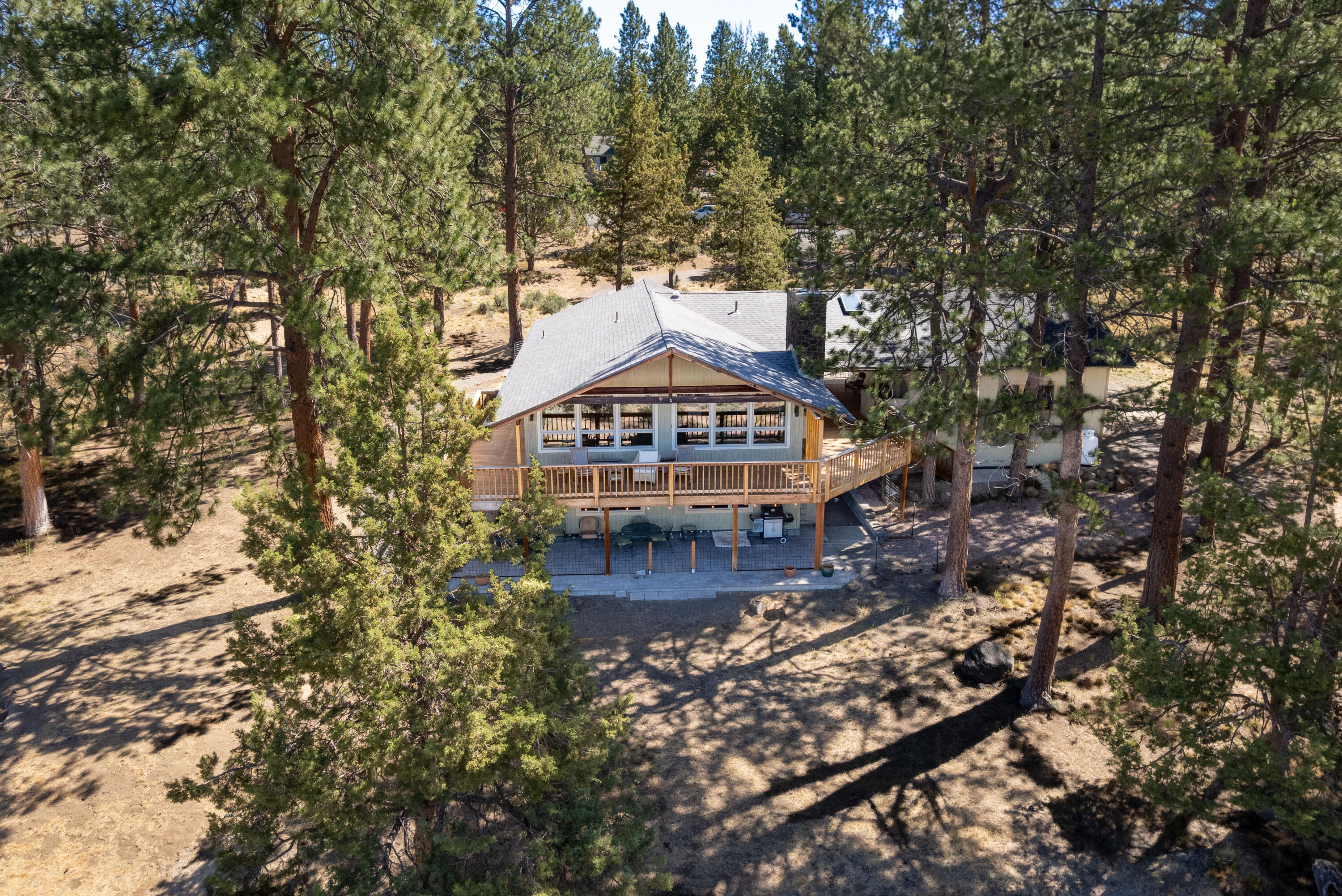 Looking for mountain views and a tranquil setting in the quaint town of Sisters? Look no further. Welcome to this lovely four bedroom, 2 full bath & 2 half bath home in the highly sought after Indian Ford Ranch community. Set on 1.64 peaceful acres, this 2688 sq. ft. home offers space, privacy and views that will take your breath away. Enjoy the sunset on your expansive deck overlooking the meadow. Inside there are large windows in the living room showcasing the beautiful view. A daylight basement features a spacious bonus room w/ a cozy gas fireplace-perfect for gatherings, game nights, or a private retreat. Recent updates include a newer roof, siding, stained deck, fireplace insert, windows & appliances providing peace of mind & modern comfort. Located minutes from downtown, this is the perfect blend of serene country living & close to town convenience. Don't miss your chance to own a slice of Central OR paradise.