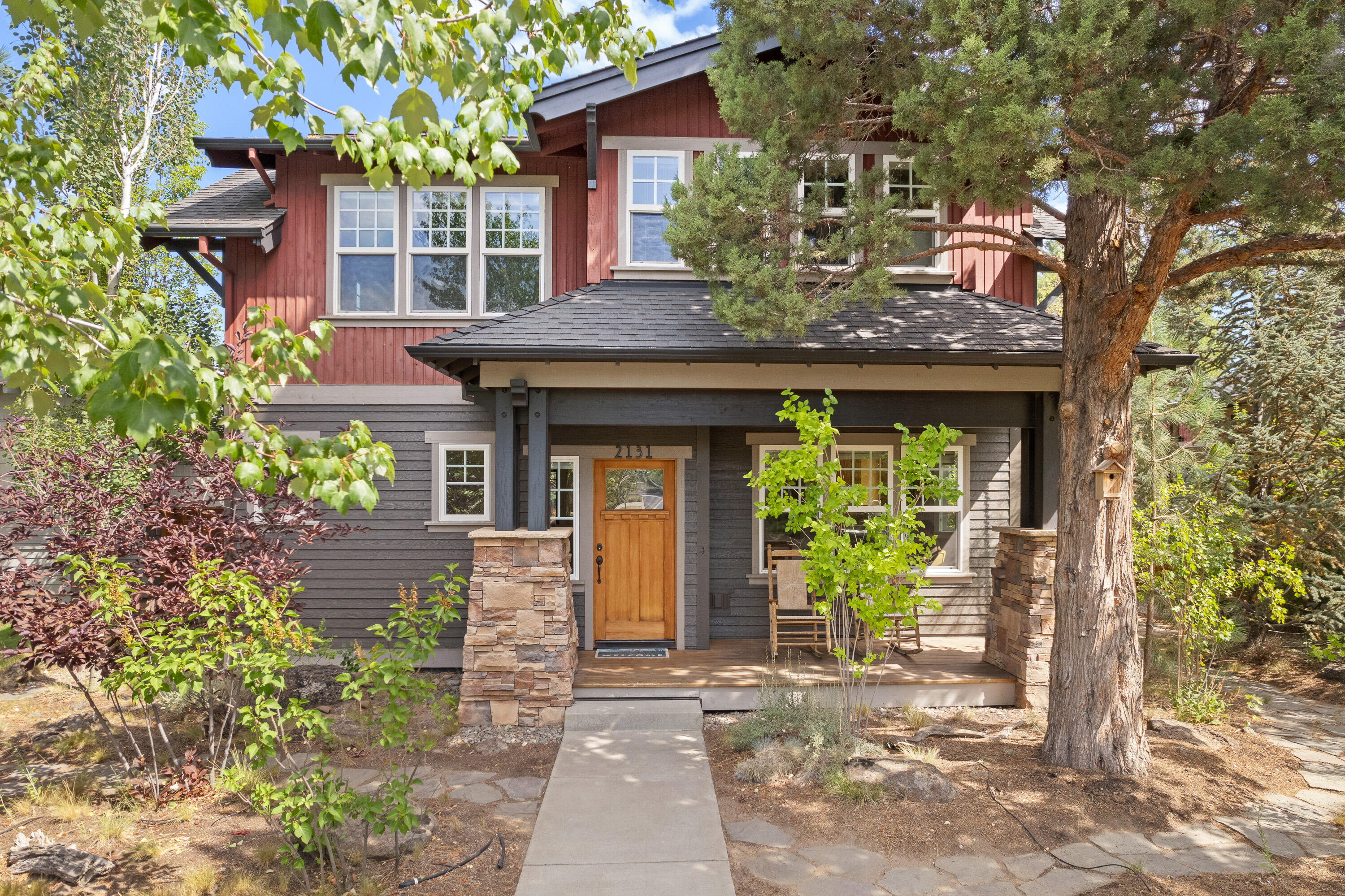 Classic NW Crossing home with close proximity to schools, trails, parks, farmer's market, & the restaurant/retail hub of NW Crossing! This spacious home is well designed for privacy, with an extra large, flexible 4th bedroom ideal for hosting guests, or using as a family room. On entry, step into the primary living area, recently renovated with a stackable 8 foot glass door leading to the covered deck, bringing the outdoors in. The kitchen has solid surface countertops, updated lighting and extended cabinets. Upstairs are three generous sized bedrooms & a full bath that is shared with the large flex space/4th bedroom. The vaulted primary suite has room for a desk & sitting area with an en suite bathroom housing a soak tub + separate tiled shower. Ceilings and deck are wired with a WiFi sound system. The spacious two car garage off the alley has beautiful cabinets & features for organized storage. Bring your toys and settle into this lovely home in the heart of NorthWest Crossing!