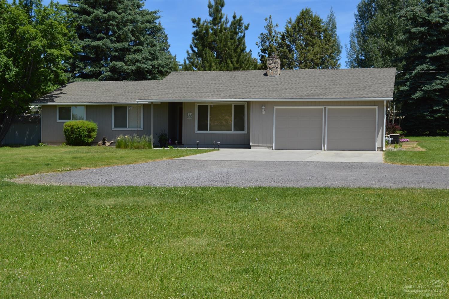 Small Irrigated acreage located in desirable Dobbin Acres. First time on the market, this well-maintained home has a park like setting with peekaboo mountain views. Oversized patio for entertaining or barbecues. This home has four nice size bedrooms, one could be used as an office or den. Sunken living area with a natural rock gas fireplace insert. The kitchen has a lot of cabinets and counter space, with a breakfast bar. Gas forced air and A/C. Plenty of room for an R/V or to build your dream shop. Only 5 minutes from town, Costco and the hospital.