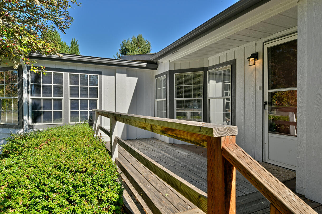 Nearly a 1/3 acre lot, with detached two car garage/shop, huge RV Parking area, and is Priced at $183. per sq foot!! This spacious triple-wide was built in 1995, is 3 bedrooms, 2 full baths, has new siding & trim, fresh exterior paint, all new interior carpets & vinyl, and is move in ready! Very quiet neighborhood, lot is meticulously landscaped, and home is located near Reinhart Park. Additional updates include, new garage door, new locks, and new exterior lighting! Home is being sold ''As Is'', Come take a look!