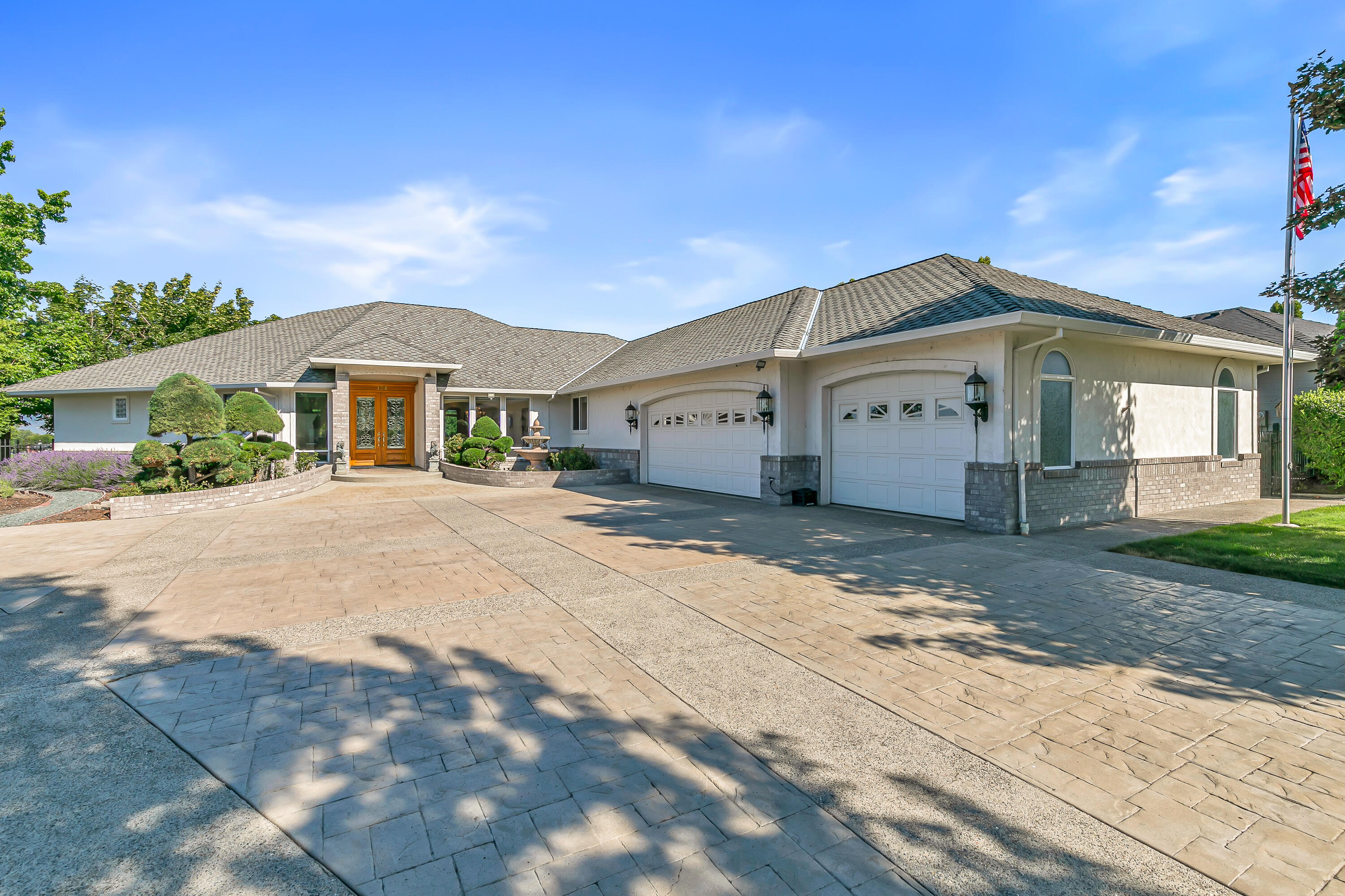 For those seeking luxury and comfort, come enjoy this beautiful Eagle Point Golf Course front home with inground lap pool on a capacious .43 ac lot, providing ample space for relaxation and entertainment. There's a lot to love about this amazing 3,250 sq. ft. home, built for entertaining with living room, family and game room with pool table & wet bar. The gourmet kitchen is a standout boasting 5-burner gas cooktop, granite counters, Sub-Zero refrigerator, and walk-in pantry, ideal for culinary enthusiasts. The split floor plan offers a Jack & Jill bathroom for the guest rooms, and the master is quite spacious with views out to the golf course, walk-in closet, lg. shower and soaking tub, and dbl. vanities. There are 9-10' ceilings thru-out. The home is serviced by two HVAC systems, vacuum system, a lifetime composition roof and 3-car garage. Out back is a spacious covered patio with built-in barbeque, and water feature. Enjoy Talon Grill at the clubhouse and all this community offers.