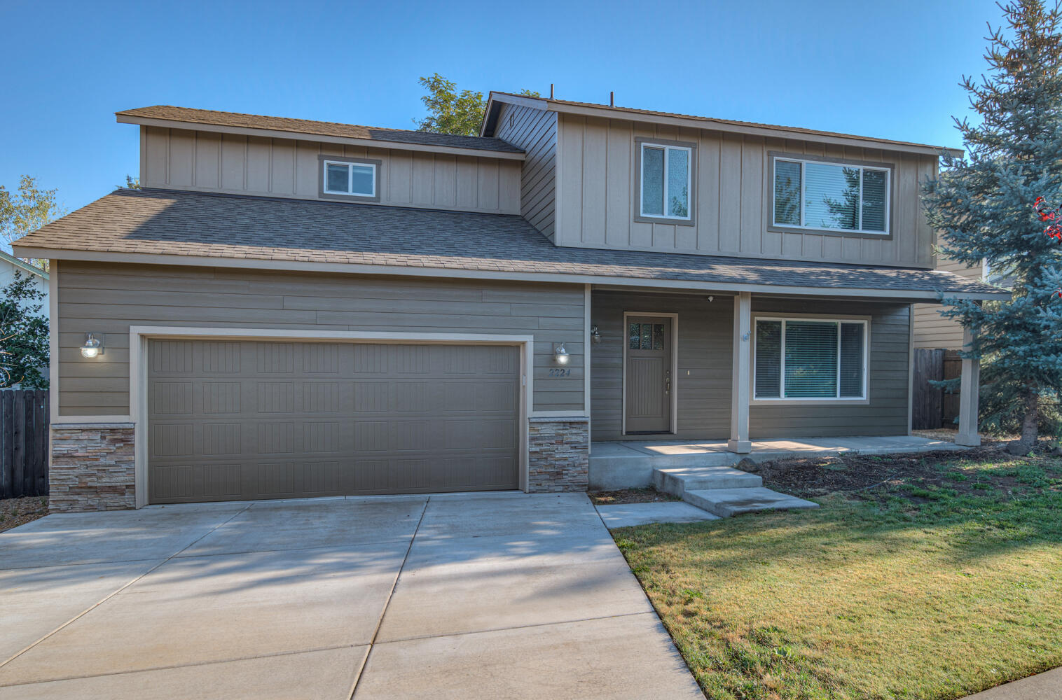 Discover the perfect blend of space, style, and location in this stunning Holliday Park home in NE Bend! Boasting a rare 4-car double tandem insulated garage, this property is a dream for anyone needing extra room for vehicles, toys, or a workshop. Thoughtfully crafted with quality construction, this inviting Craftsman-style home offers a timeless traditional layout plus a spacious bonus room, perfect for entertaining or relaxing.
Inside, you'll find upscale finishes throughout, including slab granite counters in the kitchen and baths, custom soft-close cabinetry, rich hardwood floors, vaulted bedroom ceilings, and a tree-top deck to enjoy the outdoors. Comfort and efficiency come standard with central A/C, a 95.5% efficient furnace, Hardiplank siding, and a 35-year composition roof.
Situated in a quiet neighborhood close to schools, medical facilities, and shopping, this home delivers both convenience and charm.