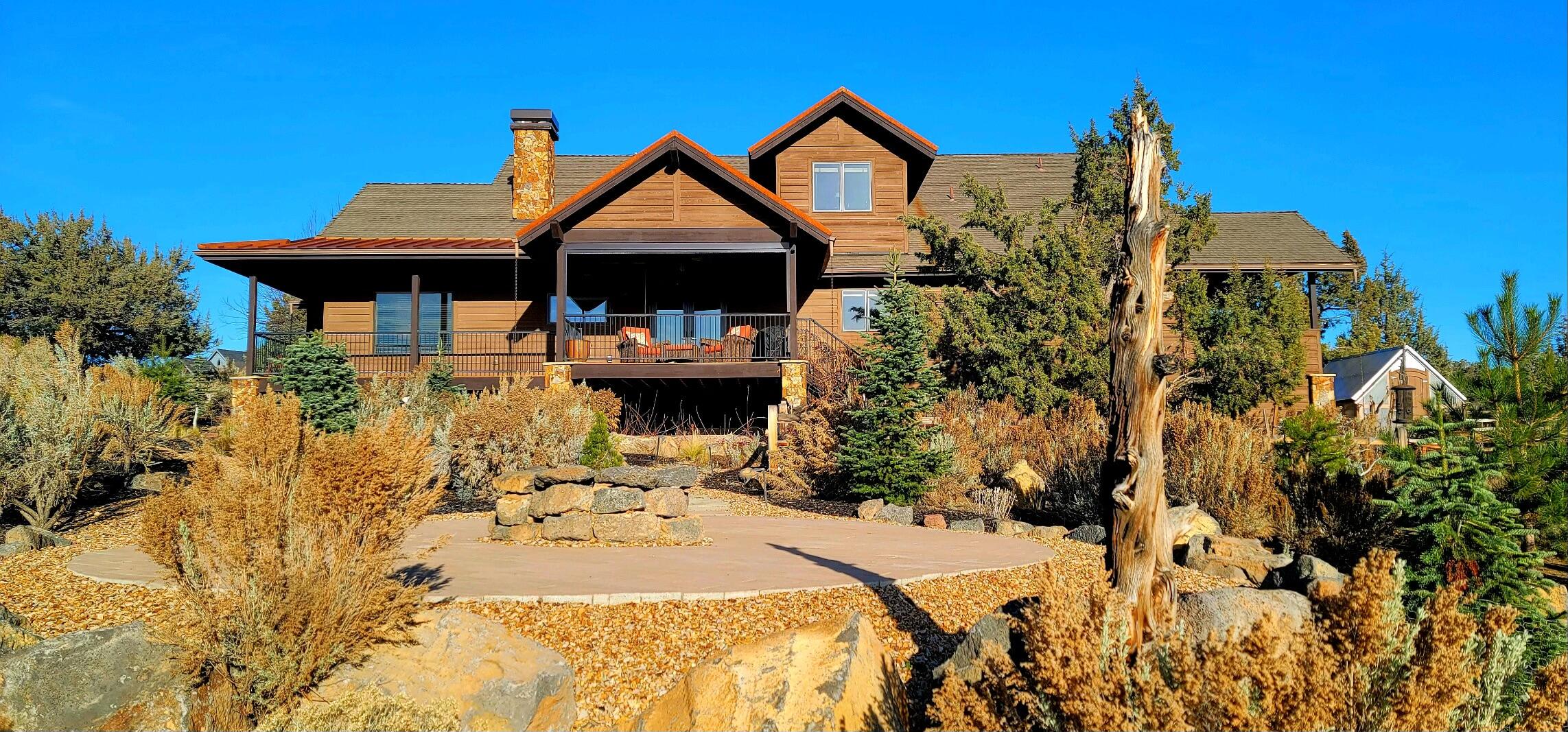 Beautiful Craftsman Style Home with custom stone columns on the exterior & panoramic Cascade Mountain views from the incomparable outdoor living space. This home opens up to a slate entry, open floor plan, vaulted great room with warm hardwood floors & a gorgeous custom stone fireplace. An office that boasts of mountain views through the expansive windows & a kitchen that is perfect for entertaining with knotty alder cabinets, stainless steel appliances, granite counters, & an island with bar area seating. The primary bedroom is located on the first floor & is a peaceful oasis to relax & unwind with lovely views off the private deck, a tiled shower, soaking bath, & a large walk-in closet. Upstairs are two additional bedrooms that features ensuite bathrooms making them ideal for hosting guests. Large three car garage for your storage needs. This home is situated on a spacious 1.22-acre lot with a greenhouse & a firepit to enjoy all the outdoor experiences Brasada has to offer.