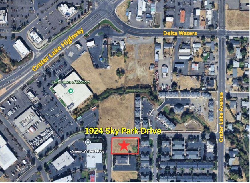 Great location with SO MANY possibilities! Located just behind Lava Lanes, and a block from the new Creekside Village Apartments. This nearly level corner lot has all utilities available at the street. Zoning allows for a huge variety of uses, including manufacturing, business offices, 'eating and drinking places', auto repair, medical and dental laboratories, government buildings, car/boat/motorcycle dealers, funeral service, motion picture production, even botanical and zoological gardens!  Potential owner-carry terms.