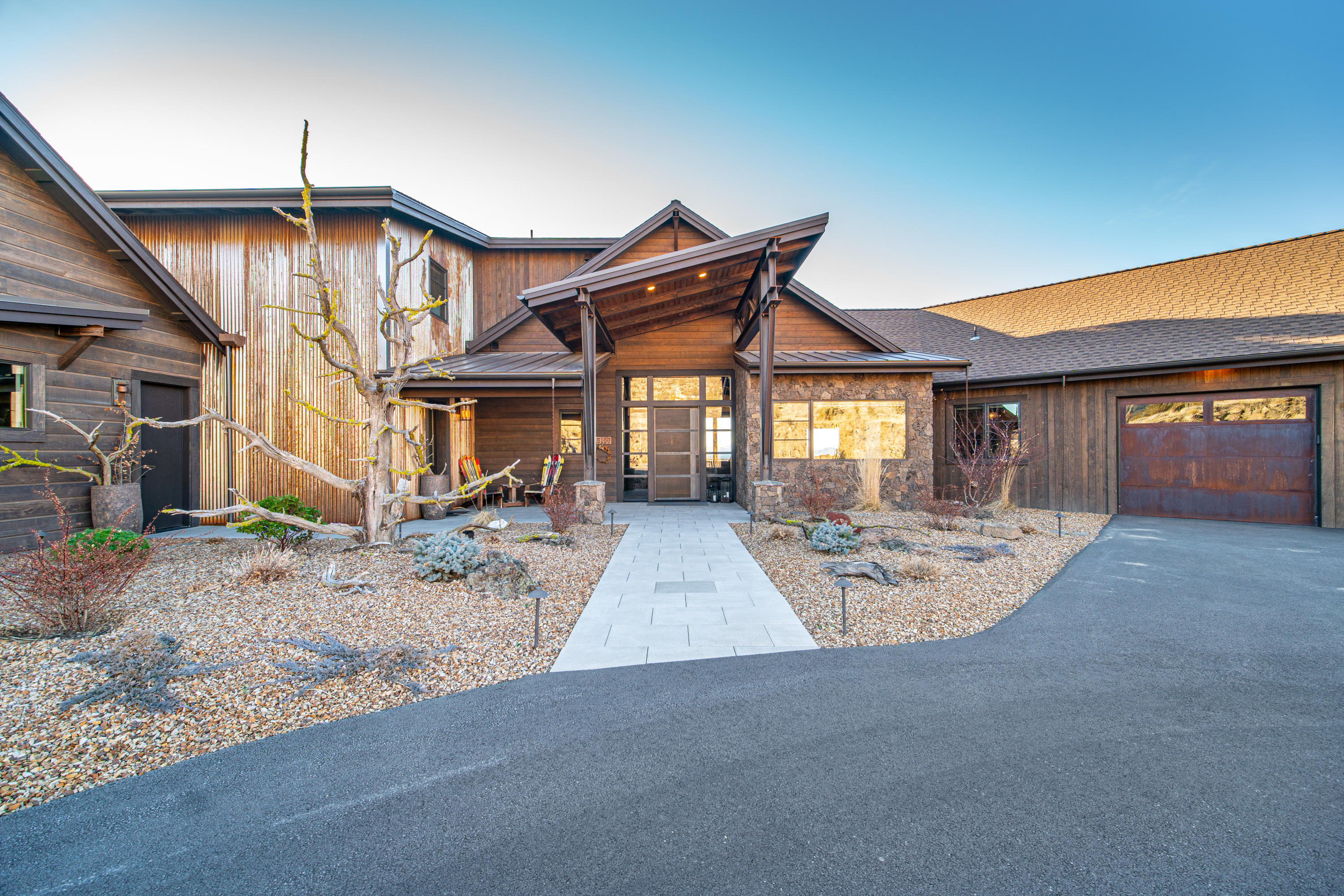 Breathtaking Cascade Mountain views from this impeccably designed & quality built home perched on just over 5 acres. Just minutes from Brasada Ranch & all of it's incredible amenities.  Expansive Great Room layout that flows seamlessly into the kitchen & dining & features a cozy wood burning fireplace. Well thought-out kitchen features Thermador appliances, large eating island, incredible pantry & all the amenities for any level of chef.  Main floor master bedroom separation with spa-like bath, fantastic views & peaceful patio.  Light & bright office located near the master bedroom for the work at home professionals.  Two additional en-suite bedrooms on the main level enjoy privacy, comfort & access to the outdoors.  Upper level living area features a getaway with views that could be a media/game room (with bed) or additional office with a separate entrance.  In every space the attention to detail is evident. 5 car garage, expansive patio and grounds.  An oasis of privacy.