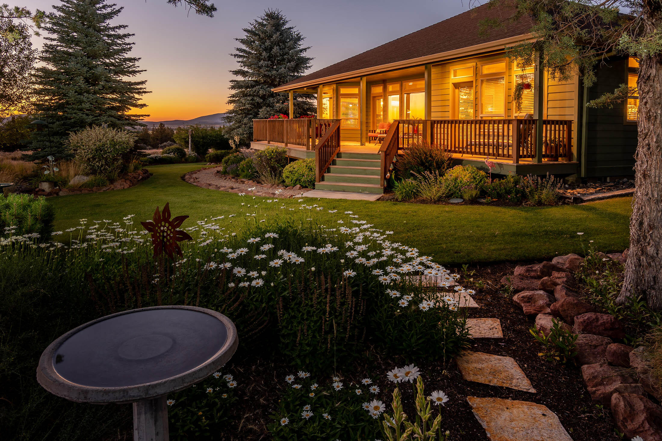 Peaceful Country Setting w/ Cascade Mountain views serving as a perfect backdrop for this beautiful 2703 Sq Ft Custom Home on 5 acres. Plenty of outdoor living from morning coffee at sunrise to evening breezes at sunset from the covered decks & open patios. Built in 2001, this 3 bedroom, 2 1/2 bath home offers a semi-open floor plan, tiled entry w/ guest suite separate from master & additional bedroom. Living room showcased by arched doorways, built in niche, wet bar, bookcases & Gas FP, spacious kitchen w/tiled counters & backsplash, hardwood floors, gas cooktop, wall oven, garden window, island, & eating bar, adjacent kitchen nook accessing lg deck. Formal D/R has built in China hutch & coffered ceiling. Lg master, tiled shower, walk-in closet, dbl vanity, garden tub, & access to deck. Triple car garage w/shop bay plus det single garage/storage room. Paved entry, gated & fenced property surrounds this picture-perfect oasis! Private RV area w/water, sewer & power!
