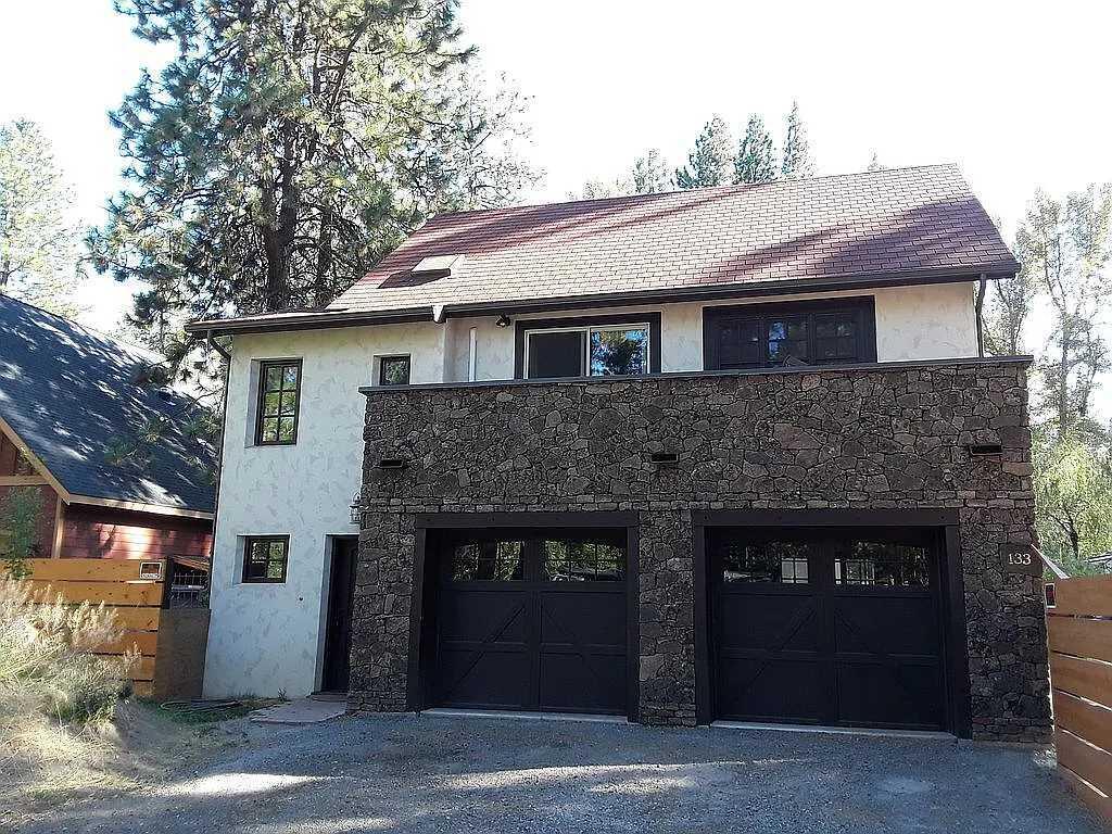 Property consists of two separate detached residences on .29 acre lot. The original single level 1,200 SF manufactured house on a foundation which has been updated and a newer two-story ICF built 750 SF house, foyer, office/bonus room, and 3-car garage. Property sits directly on 80' of frontage on Whychus creek and is surrounded by large Ponderosa pine trees. Property is fully fenced and has lots of room for storage of vehicles, RV, animals, etc. Great rental income property at $4k + monthly. Property will qualify for conventional financing with the newer house. Property will qualify for conventional financing with the newer house. Possible lease option purchase. Seller will consider aircraft or RV towards down payment.