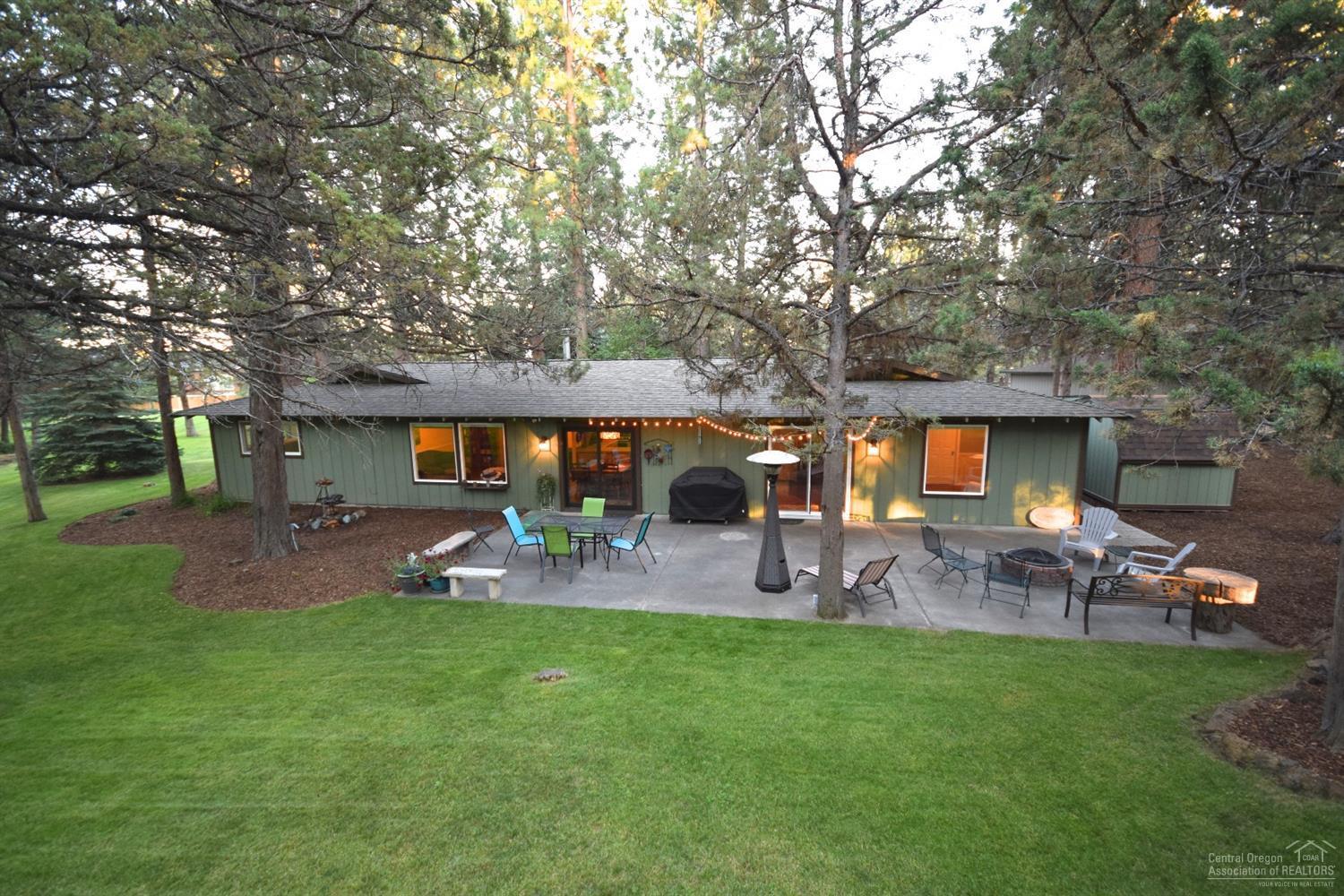 Don't miss this freshly remodeled gem. Situated on a large .35 acre lot that backs to greenbelt common area. It feels like you are living on acreage! Kitchen remodeled with granite & tile counters and stainless appliances. Hard surface laminate and tile throughout for easy maintenance. Huge bonus room with tons of space for entertaining. Hall bath was just remodeled with tile shower and pedestal sink. Too many features to list! Ask your broker for the features list.