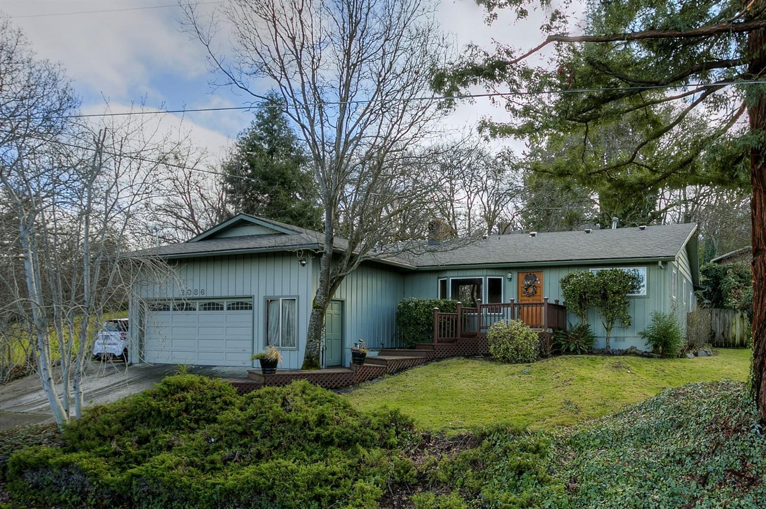 Beautiful East Medford Home! 3 bedroom/2 bath home with high ceilings and stunning Madrone Hardwood Floors. Large master suite with sitting area. Granite counter tops and shower surround. Doors to deck with hot tub off of the Master Bedroom. Peaceful sitting areas and 3rd bedroom has access to patio area with walk-in closets & large storage area. Over-sized 2 car garage with high ceilings, plenty of storage, shelving and garage door opener. Great Location, A Must See For Sure!!!