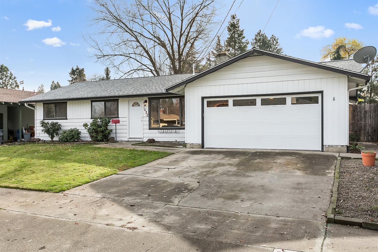 Centrally located in East Medford. This 3 bedroom, 2 bath home offers 1530 sq. ft., two living rooms, new counter tops and a good sized backyard. There is a two car garage with a brand new garage door.