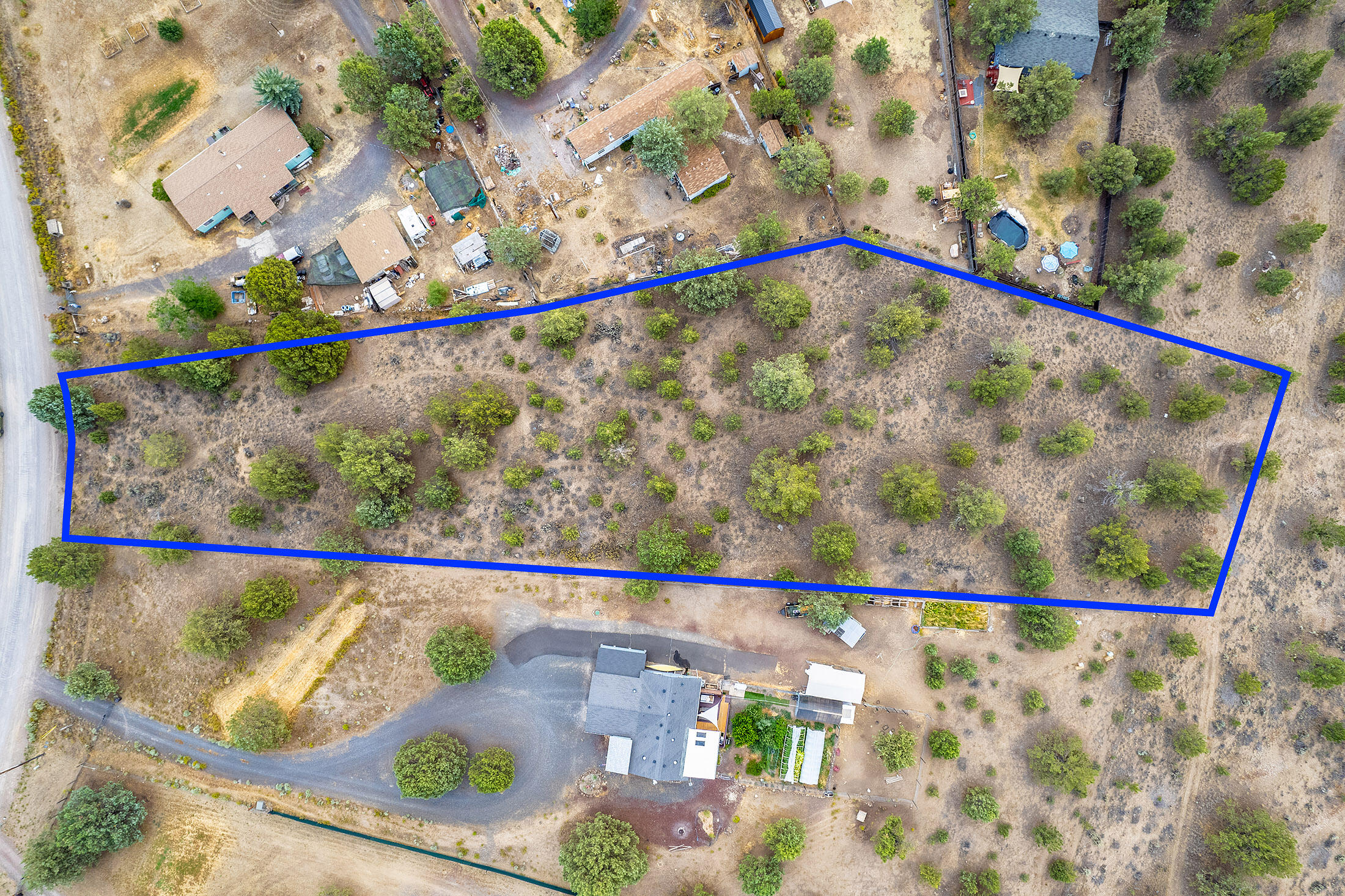 THE PRICE IS RIGHT!  Yes, this 1.68-acre lot is priced for you to build affordably!!  Neighboring fences are in, power is at lot line, community water is ready to connect to.  Just needs septic feasibility, with sandy soil and no apparent rock!  Adjoins community tract to the rear of the property. and is just off a paved road!  Join our community, where passions and friendships flourish!  With a very forgiving 18-hole scenic golf course, tennis & pickleball court, fishing, disc golf, and water and snow sports nearby.  This vibrant destination is a favorite choice for those looking to retire, relocate or just change course!