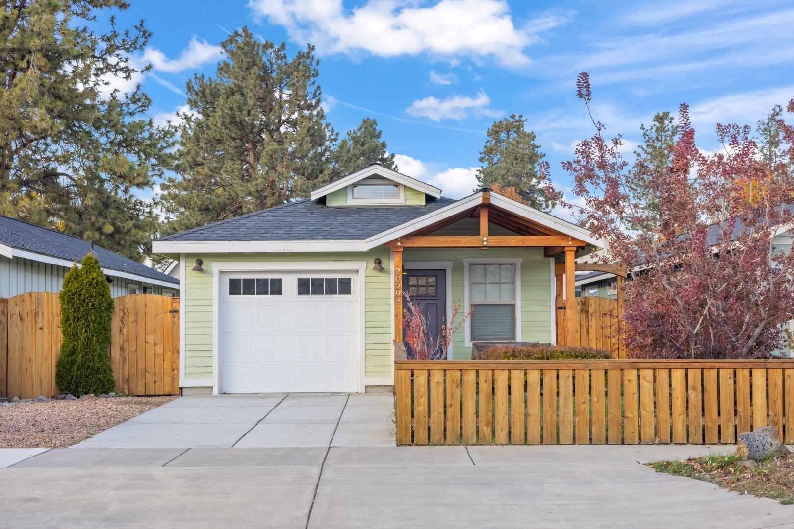 BOM at no fault of property. Move-in ready in desirable NW Bend! This charming single-level home is ideal for all buyers—whether you're searching for a full-time residence, a weekend getaway, or an investment in one of Bend's most sought-after neighborhoods. Beautiful hardwood floors flow throughout the open-concept living space. The kitchen features granite countertops, stainless steel appliances, a pantry, and all appliances are included. The living room offers vaulted ceilings and a cozy gas fireplace, while the sitting room is perfect for morning coffee or a home office. The updated bathroom includes a tiled shower, heated floors, and a modern vanity. Enjoy the fenced front yard with sprinklers, a welcoming porch, and a private back patio with a gas hook-up for BBQs. A one-car garage provides space for all your Central Oregon gear. This home has it all—style, comfort, and an unbeatable location!
