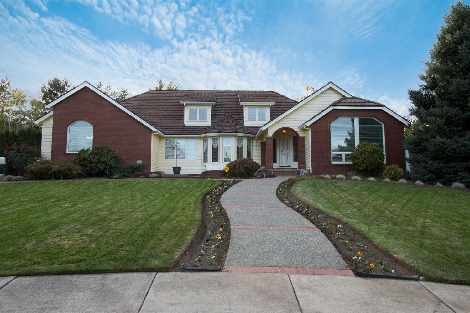 Fantastic East Medford home, incredible neighborhood, & perfect location! This is a must see 4 bedroom, 3.5 bath, 3,190 sq. ft. home w/master on the main level. Immerse yourself as you walk through this amazing park-like setting backyard with a large self-refilling waterfall, in-ground propane fireplace, & large gazebo on your way to your very own secret garden area to relax and let the day just drift by. Or enjoy a rainy afternoon with a book in one of your two upstairs window seats. Noted Features: Secret Garden, Park-like setting, Waterfall/Feature, Pot filler Kitchen Stove Faucet, Granite Kitchen Counter Tops, Trash Compactor, Double Wall Ovens, Large Kitchen Island, High Ceilings, Built-In Wall Speakers, End of street Cul de sac, soaker tub in master bathroom, 3 car finished garage w/attic storage, Gas fireplace, In-wall fold down ironing board, 2 huge master bedroom walk-in closets, & professionally landscaped front and backyards. This home is move-in ready!