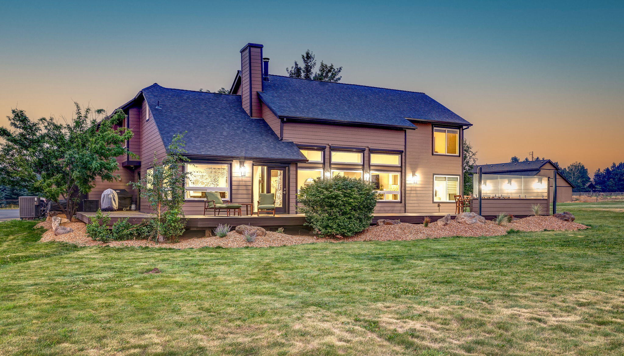 Enjoy a rural lifestyle in that is a testament of how well a home well a home can be beautifully upgraded with attention to every detail. The gourmet kitchen is a chef's dream with GE Profile appliances & a cozy dining nook. Take in the mountain views from the vaulted great room, dining room & expansive decks for outdoor living. The elegant primary bedroom suite is your private sanctuary with your own personal sauna. The irrigated pastures will provide enough feed for your critters, plus the one acre of lavender will soothe your soul & the tree farm will supply you lifetime of Christmas trees. This ''Path of Progress'' parcel may some day be incorporated into the City Limits with expansion of the Urban Growth Boundary.