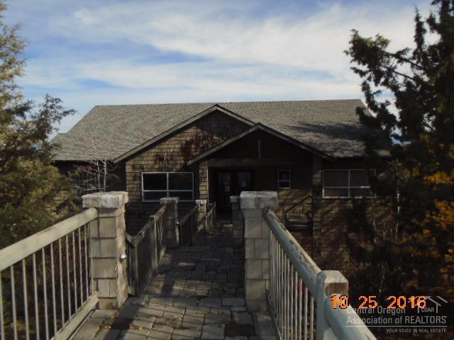 Light & bright home with beautiful eastern views from Smith Rock to Pilot Butte.Large master on the main level with on suite that features Jacuzzi spa ,shower & dbl vanities. Travertine floors in the kitchen,bath & entry.Granite counters in Kitchen. Great room upstairs and formal dining.Family rm & 2 additional bedrms and full bath downstairs.Tons of decking.See attachment for PAS requirements and WFHM offer submittal information in MLS document section.Please submit all offers to the listing broker/agent.