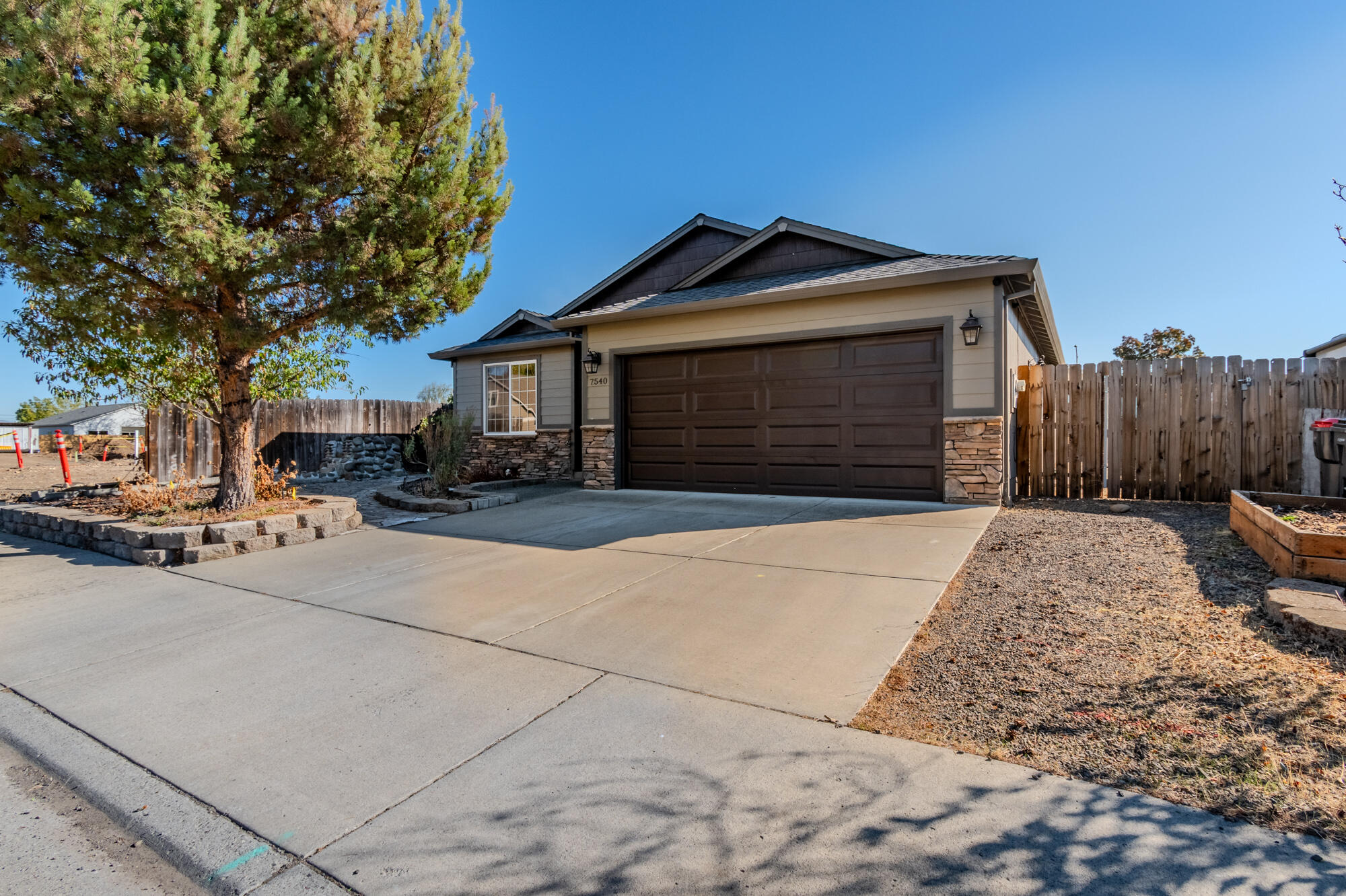 Just off Ave A near Atlantic Ave. Convenient to town yet close to country, this 2008 built home is just right. You will like the rich vibrant exterior colors. This home features granite counters with an eating bar plus natural gas range/oven. Open floor plan for Great room style living with vaulted ceiling. Patio in back yard is ready for your BBQ. Come home and enjoy your new life in this fully fenced back yard. I almost forgot the matching shop/ She shed in the back yard as well.