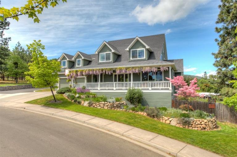 A lovely & generous front porch & curbside appeal welcome you to this beautiful family home in the highly desirable Strawberry/Westwood area. Expansive decks & windows provide amazing views of the Cascade range & Grizzly peak. Main floor offers a large family room with gas fireplace, formal dining room, living room & newly remodeled gourmet kitchen with stainless steel appliances. The master suite & bath are located upstairs along with 3 addt'l bedrooms, a full bath and computer room. The addt'l 880 sf living qtrs can be accessed from the main house & also has its own separate exterior entrance. The guest suite has 2 bdrms, 1 bath and a lrg light filled spacious room.(Family room/yoga/art). Included in total SF. Large, private yard provides mature landscaping, perpetual blooms, deer proofed garden with 4 raised beds, hot tub and beautiful outdoor dining area overlooking views & property. Surrounded by hiking trails, wildlife & open space yet close to town and Lithia Park! Agent owned.