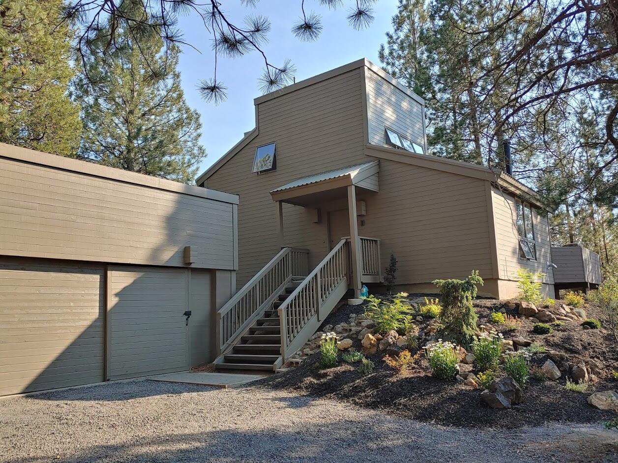 Welcome to this unique Sunriver home boasting features that would make it an excellent investment opportunity for someone looking to buy a property in Sunriver. The three levels and three bedrooms provide ample living space for full-time living or for vacation rentals. The updated kitchen, pellet stove, and office space are all great features that add to the home's functionality and character. The multiple deck areas, hot tub, and grassy area offer plenty of outdoor space for relaxing and enjoying the Central Oregon lifestyle. Nestled just behind the SHARC this location is close to the bike path and Sunriver Village & Nature Center, making it easy to enjoy all the activities and amenities that Sunriver has to offer. Finally, the large storage shed provides a convenient place to store all of your outdoor equipment and toys. Overall, this Sunriver home has a ton to offer and would make a great investment for anyone looking for a comfortable and functional property in a desirable locatio