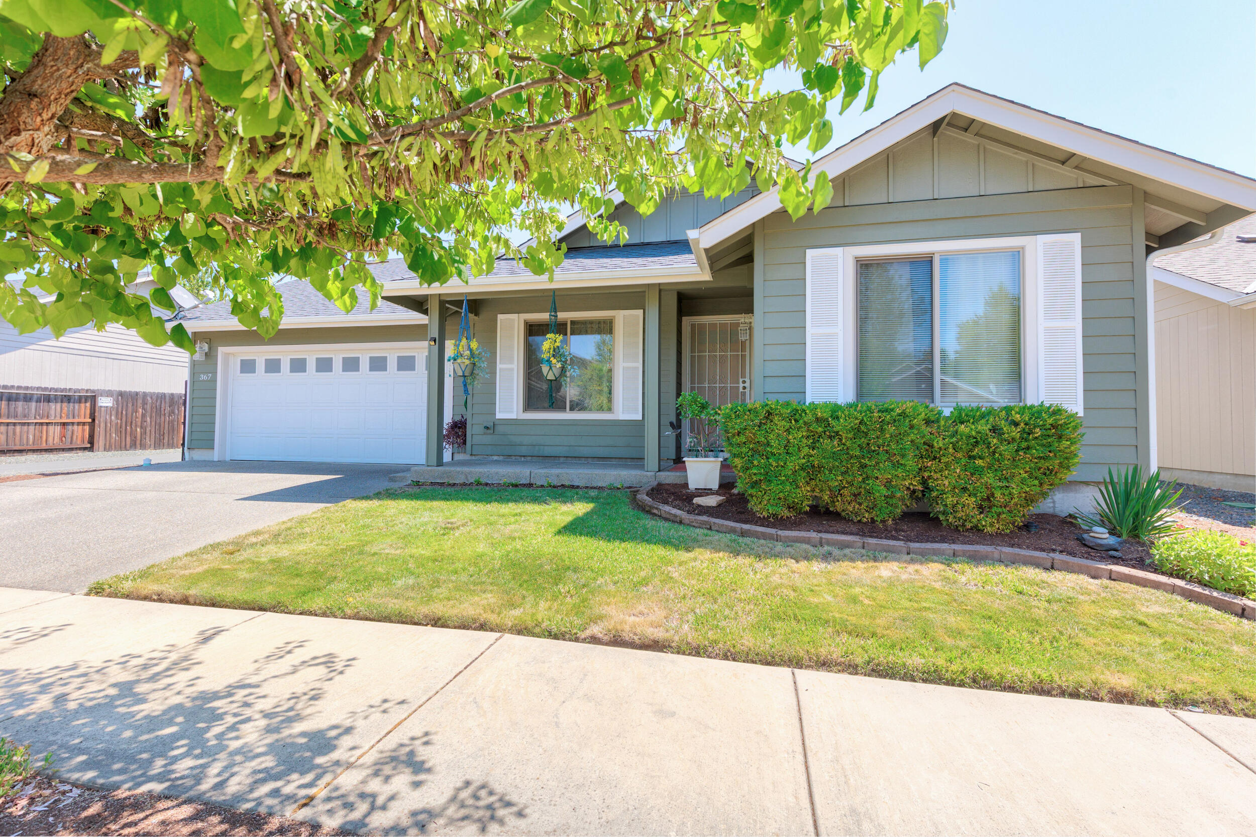 Built in 2012, this well-maintained 3 bedroom, 2 bath home is nestled on a 0.11 acre lot. The home offers 1,502 square feet of comfortable living space and features a desirable split floorplan with an open-concept layout perfect for both everyday living and entertaining. The spacious kitchen boasts ample counter and cabinet space, ideal for cooking, hosting, or staying organized. It flows seamlessly into the dining and living areas, creating a warm and connected living experience. A brand-new HVAC system installed in 2024 provides year-round comfort and energy efficiency. Step outside to a covered back patio that overlooks the beautifully landscaped yard, perfect for relaxing or outdoor gatherings. A storage shed adds convenience and extra space. For added peace of mind, the seller is offering a home warranty, making this home an even more attractive and worry-free opportunity. Conveniently located, this move-in-ready home offers comfort, functionality, and charm.