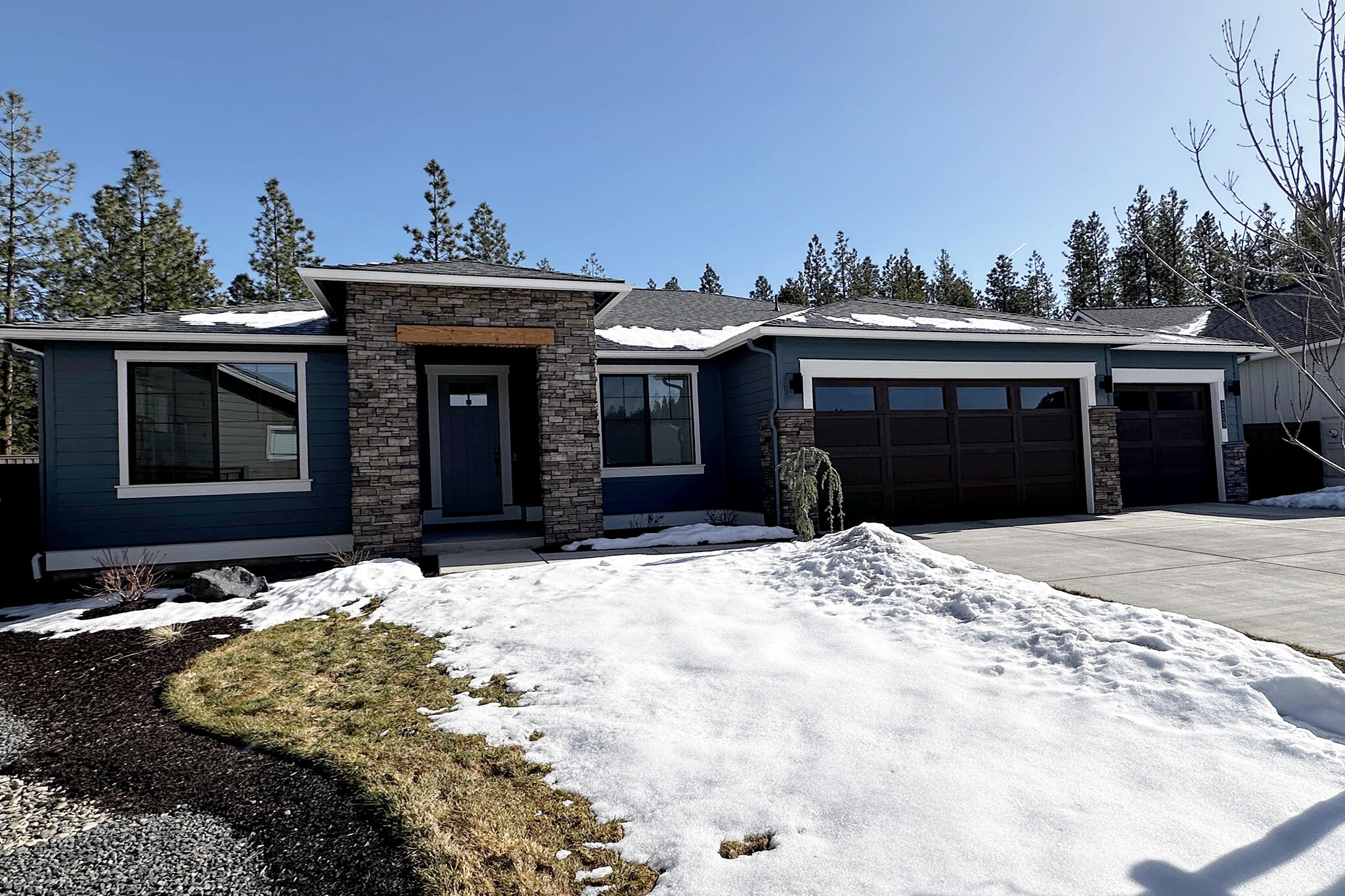 Built by award winning Pahlisch Homes and just over one year old. Tucked at the end of a cul-de-sac on just over one third of an acre backed by green space with towering Ponderosa pines. The Bentley plan boasts 3 bedrooms + a generous bonus room/office, 3 baths and ample open space in the great room. High-end features like eight foot doors, custom built-in cabinetry, engineered wood flooring in entry, great room and kitchen/dining room, quartz island and countertops with full height kitchen tile backsplash, Kitchen Aid Stainless-steel appliance package with gas cook-top and wall oven, walk-in shower with tile floor and tile surround (primary bedroom only), and smart home integrations. Come enjoy being proximate to all the west side of Bend has to offer whether it be the restaurants of Northwest Crossing or the ease of accessing Shevlin Park, mountain bike trails or Mount Bachelor.