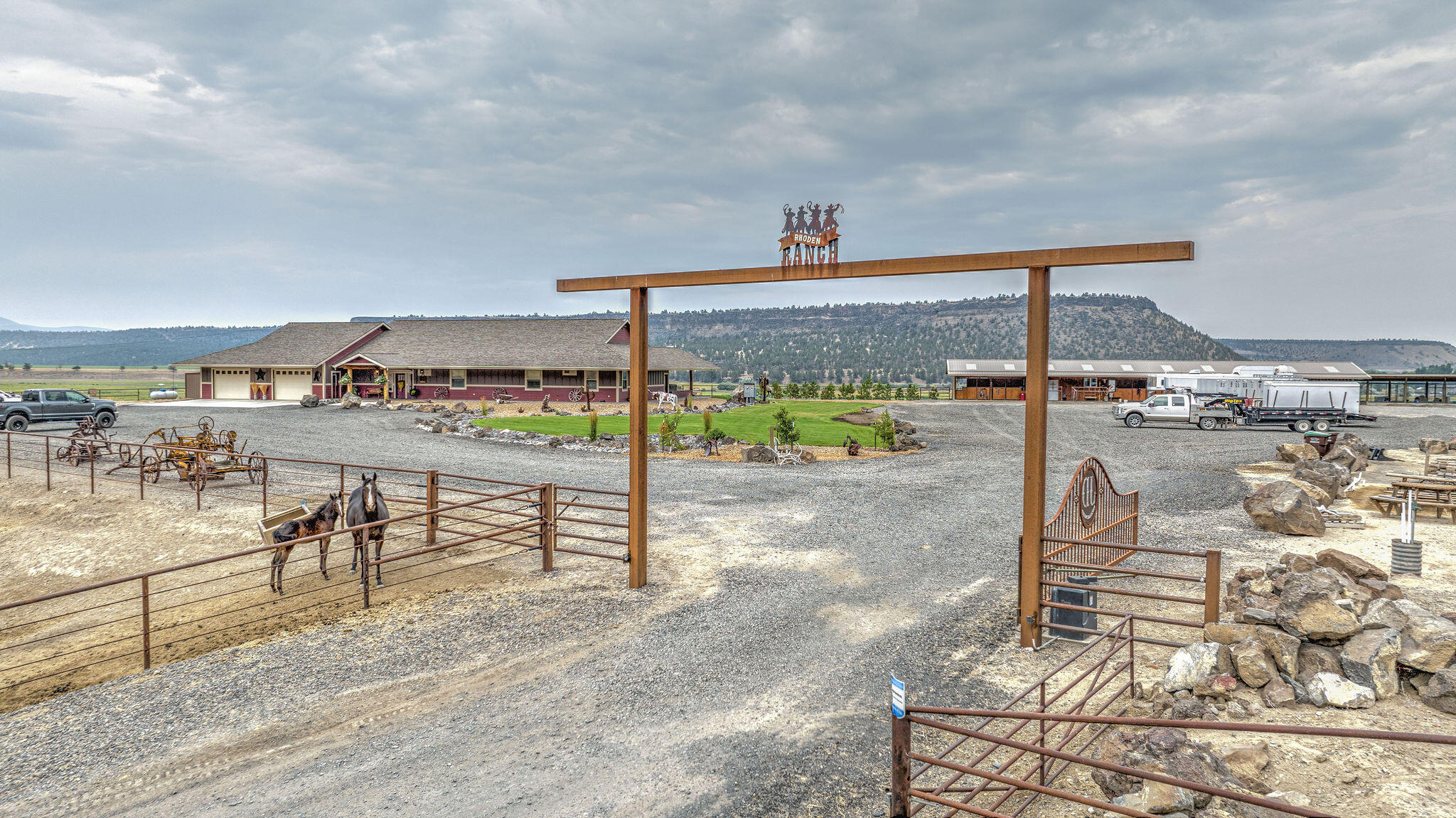 This small ranch has a convenient location that offers a quiet country setting, yet locatedjust minutes from downtown Prineville & less than an hour from Bend, The nearly 3,491± square foot, single level custom home, built in 2018, overlooks the Crooked River Valley, farm fields & wide opem pastures below. This beautiful homes features an expansive master bedroom, huge great room, stunning kitchen, a large den (perfect office or extra bedroom), big pantry, mud room, wet bar, large coverd patio & barbeque area, hot tub, pool, and gorgeous landscaping. High end finishes are noted throughout this home, including hardwood floors, granite countertops, a copper farmhouse sink, alder cabinetry & stainless steel appliances. Spoil your horses from the nice horse barn that offers 6 stalls, each with large runs. The horse barn features and oversized tack room, outside wash rack & hay storage. The property includes a 3 bay shop, 270'x150' outdoor roping arena, 2 turnouts for cattle & more!