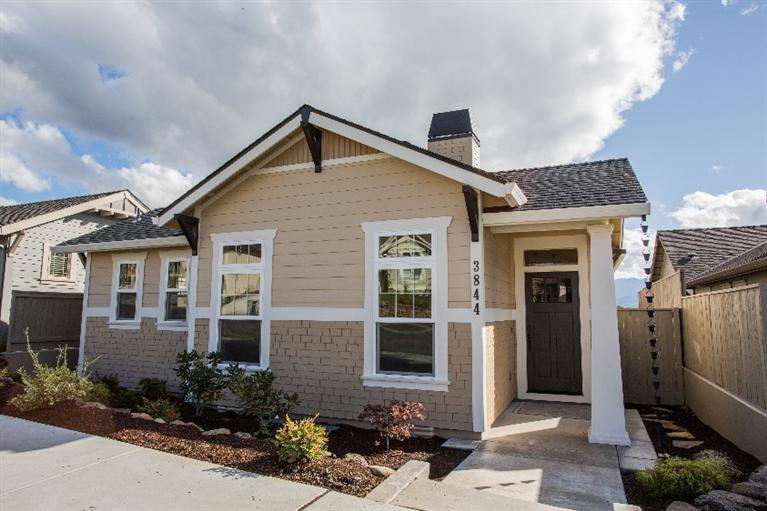 Just finished!! Cute craftsman style cottage home. Tuscany oak handscraped hardwood floors. Caesar stone kitchen countertops with tile backsplash. Tile countertops, flooring, and showers in bathrooms. Smaller, easy maintenance yard with courtyard patio. Very energy efficient green building. Earth Advantage Platinum certified. Bridgeport plan.