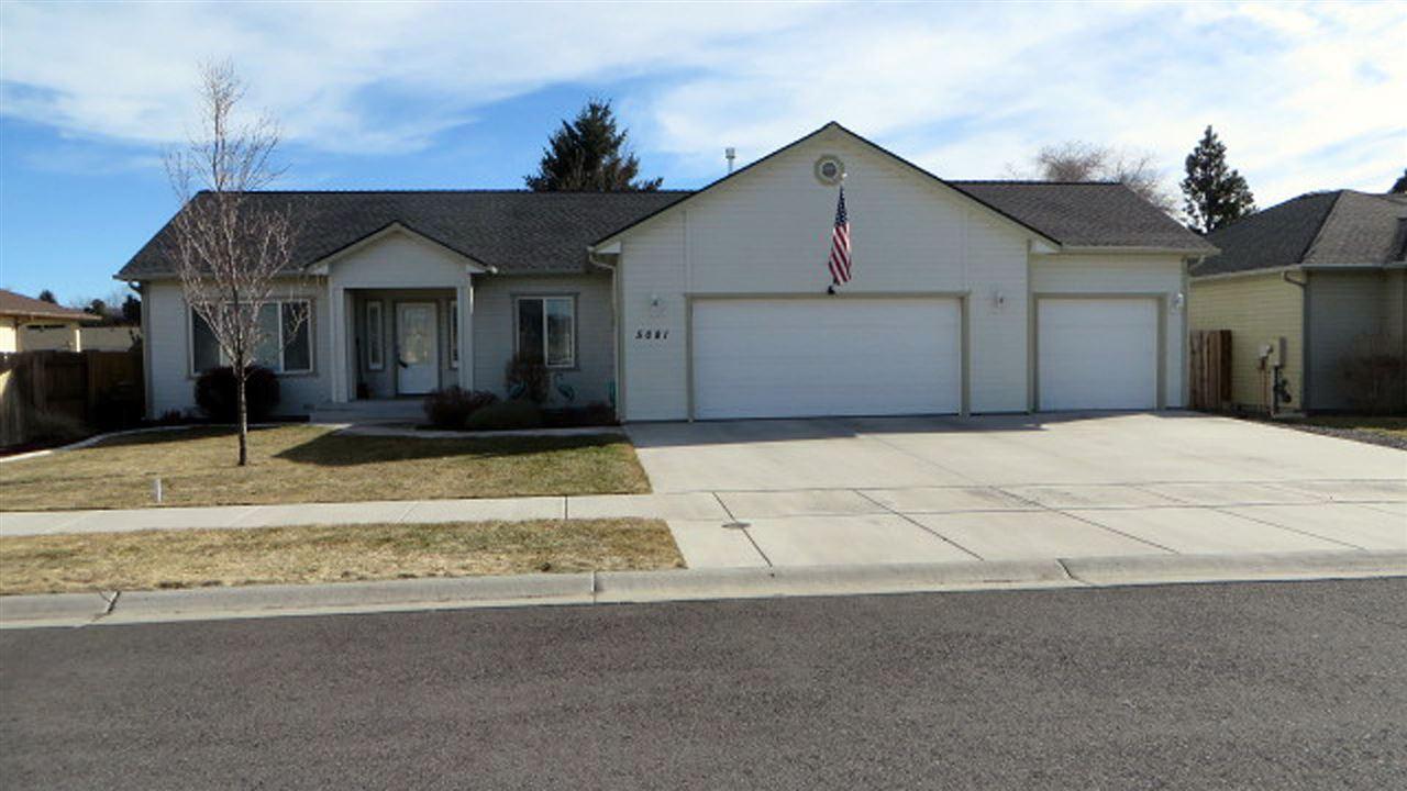 Appealing Home With Open Floor Plan And High Ceilings! Built In 2008, This 3 Bedroom, 2 Bath Home Shows Better Than New With Multiple Added Features. Large Great Room With Vaulted Ceilings And Gas Fireplace. Sliders Open Out To The Deck And Over Sized Step-down Patio. Kitchen Has Upgraded Maple Cabinets With Corian Counters, Two Pantry Closets, All Appliances-range And Dishwasher Are New, And An Open Eating Area. Formal Dining Room Could Easily Be Converted To A 4th Bedroom.Spacious Master Bedroom Has Vaulted Ceilings And A Walk-in Closet. Master Bath Includes A Jetted Soaking Tub And Separate Tiled Shower. Utility Room With Loads Of Cabinet Space And Laundry Sink. Three Car Garage. Gas Forced Air Heat And Central Air Conditioning. Fenced Yard With In-ground Sprinklers. Move-in Condition!