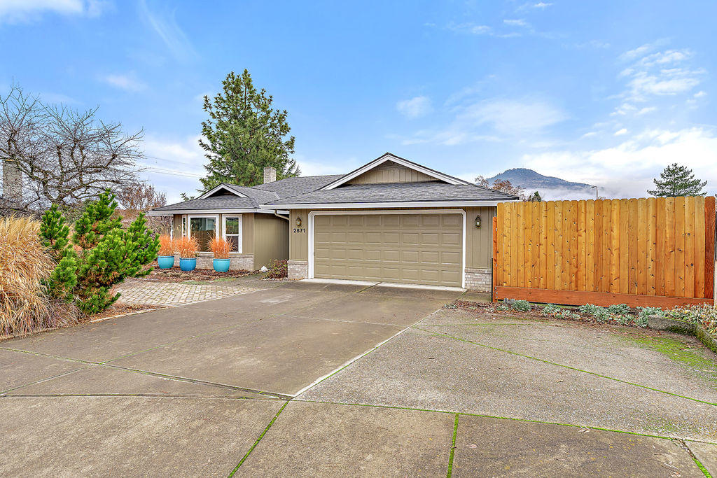 Perfect East Medford location in Lone Pine School District at the end of a Cul-de-sac.  Large .27 acre lot offers extra parking for small boat or RV.  Front yard features paver courtyard & backyard w/ flagstone patio with boulders.  Hardwood entry, lg great room w/ bay windows, formal dining room, family room with floor to ceiling brick fireplace, coffered ceilings & a slider to back yard with large deck, mature landscaping, garden beds, views of Roxy Anne & a green house. Open kitchen to breakfast nook.  Kitchen features granite counters, eating bar, double ovens, gas cook top w/ microwave hood. Good size guest bedrooms w/ walk in closets. Master features skylights, new walk in shower & tile floors. Home features brand new carpet & paint, newer Energy Star windows & window coverings, updated fixtures in bathrooms, newer Energy Star HVAC, newer water heater & roof in 2004.  Indoor laundry room includes washer & dryer.