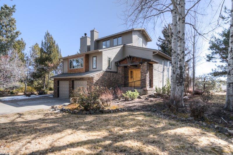 Lovely southerly view lot of .69 acres in the highly sought after Westridge neighborhood near the Athletic Club of Bend. Spacious home with 3 bedrooms, 3 baths, family room, huge bonus room, with a chef's kitchen with granite and stainless steel. Master on the main level, recently remodeled with a walk in closet and ensuite bath. Wonderful guest area/office/den upstairs is currently used as a fourth bedroom. Enclosed office/library off of the living room makes working from home an easy choice. Two bedrooms, one bathroom, family room, and huge laundry room downstairs provides for privacy for the entire household. Several options for cozying up in front of a fireplace-both gas and wood burning throughout this home! Enjoy outdoor dining on the large deck with easterly views to Pilot Butte and overlooking the beautiful landscaping and trees. Homes like these don't come on the market very often!