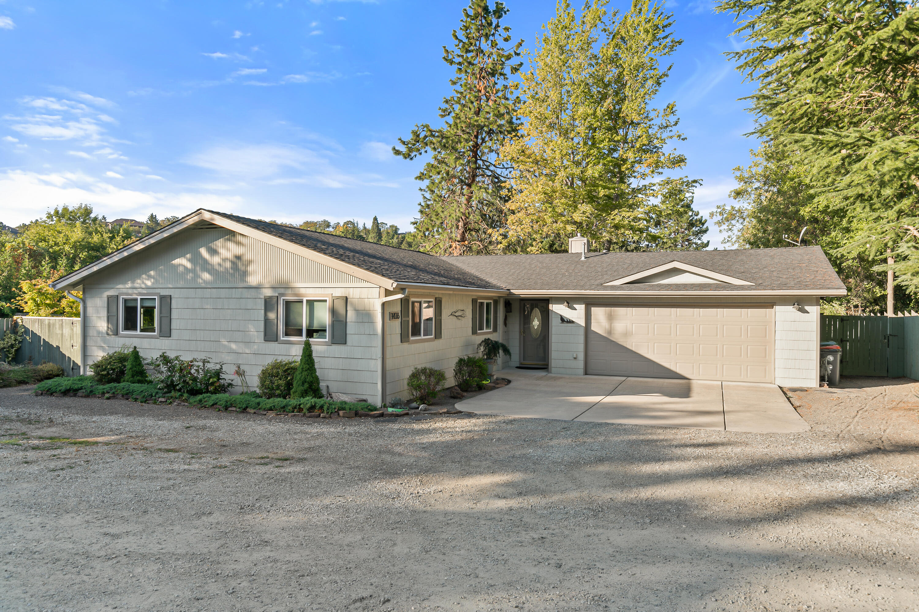 Step into comfort and style with this beautifully remodeled 3-bed, 2-bath home offering 1416 square feet of thoughtfully designed living space. The open concept layout features a spacious great room anchored by a stunning natural stone gas fireplace, perfect for cozy nights and entertaining guests. The heart of the home is the completely remodeled kitchen, boasting solid hickory cabinets, granite countertops, a large center island with eating area, stainless steel appliances, under-cabinet lighting, and durable tiled floors. The open dining area seamlessly connects to the patio, making indoor-outdoor living a breeze. The guest bathroom impresses with matching hickory cabinetry, granite counters, a large wilk-in shower, and a convenient laundry area. The primary bedroom offers a generous mirrored closet and plenty of natural light. Move-in ready and Meticulously maintained. A ''must see'' to appreciate!